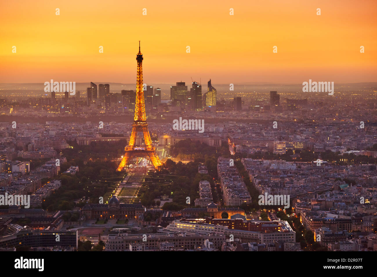 Paris skyline at sunset with the Eiffel Tower and La Defense, Paris, France, Europe Stock Photo