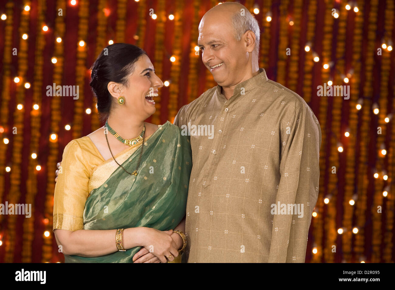 Couple smiling at each other Stock Photo - Alamy