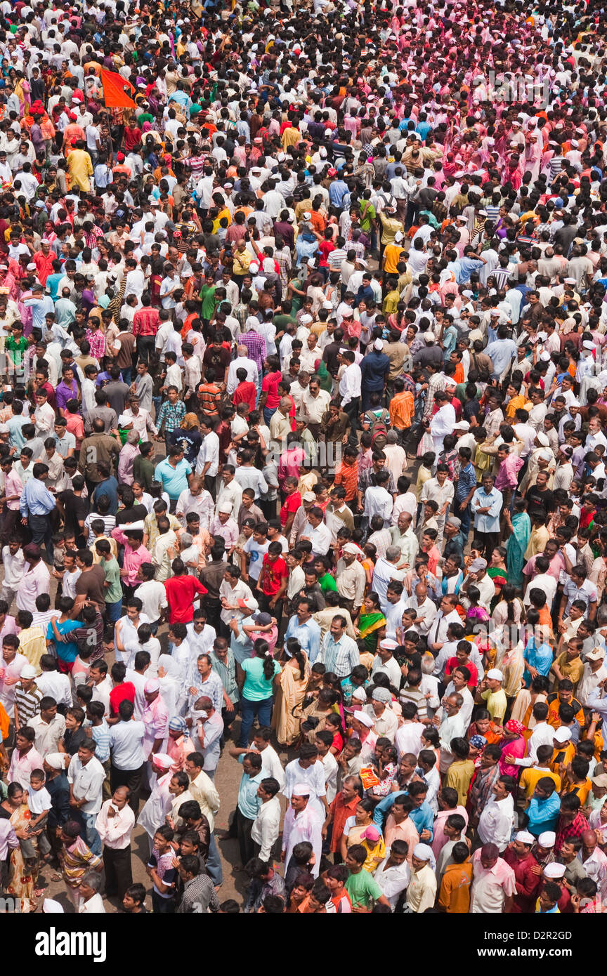 Crowd at religious procession during Ganpati visarjan ceremony, Mumbai, Maharashtra, India Stock Photo