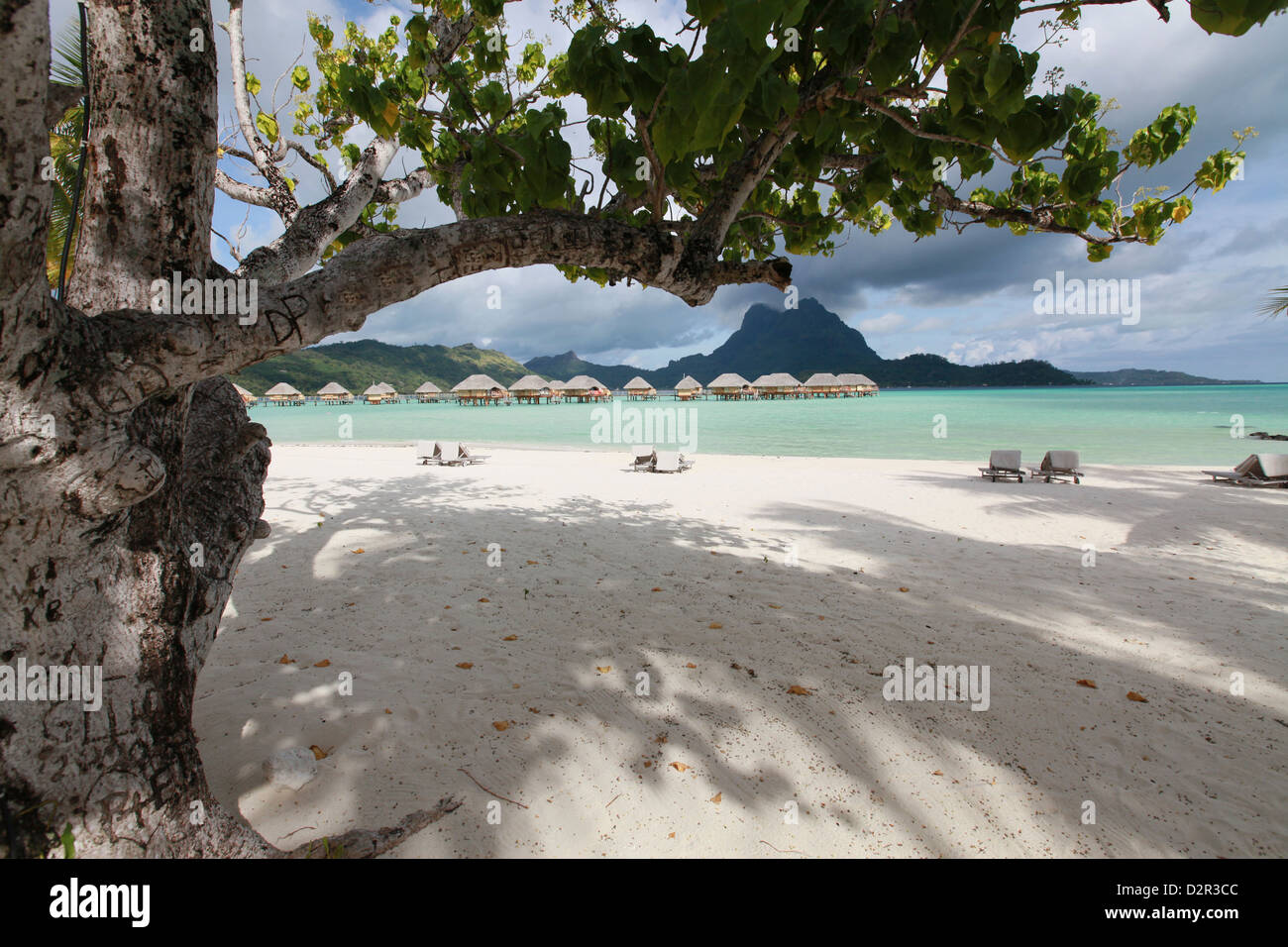 Over-water bungalows on the lagoon at Bora Bora Stock Photo