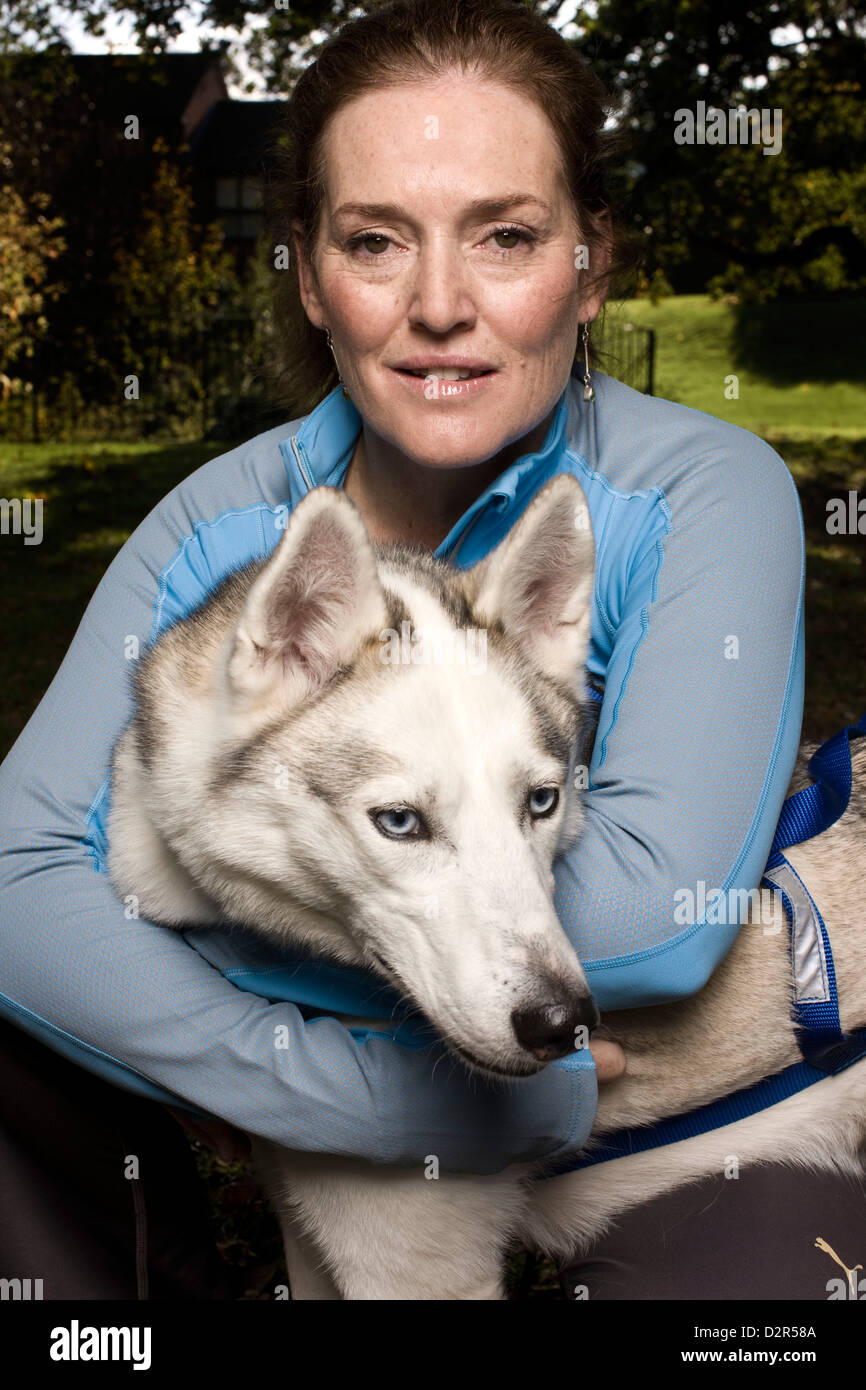 Portrait of dog owner with husky, affection Stock Photo Alamy