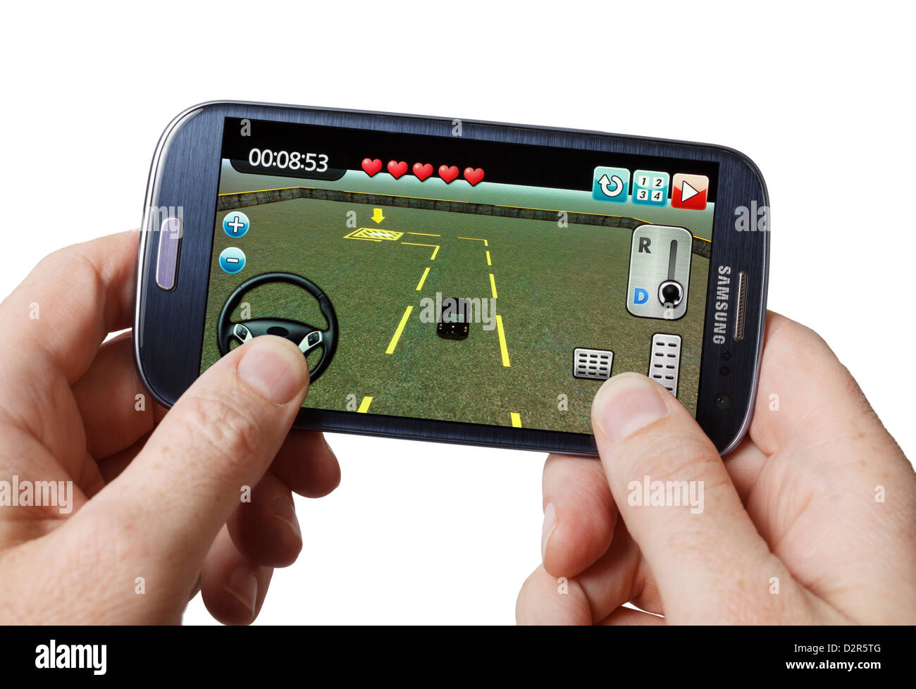Playing a game on a mobile phone smartphone smart phone Stock Photo