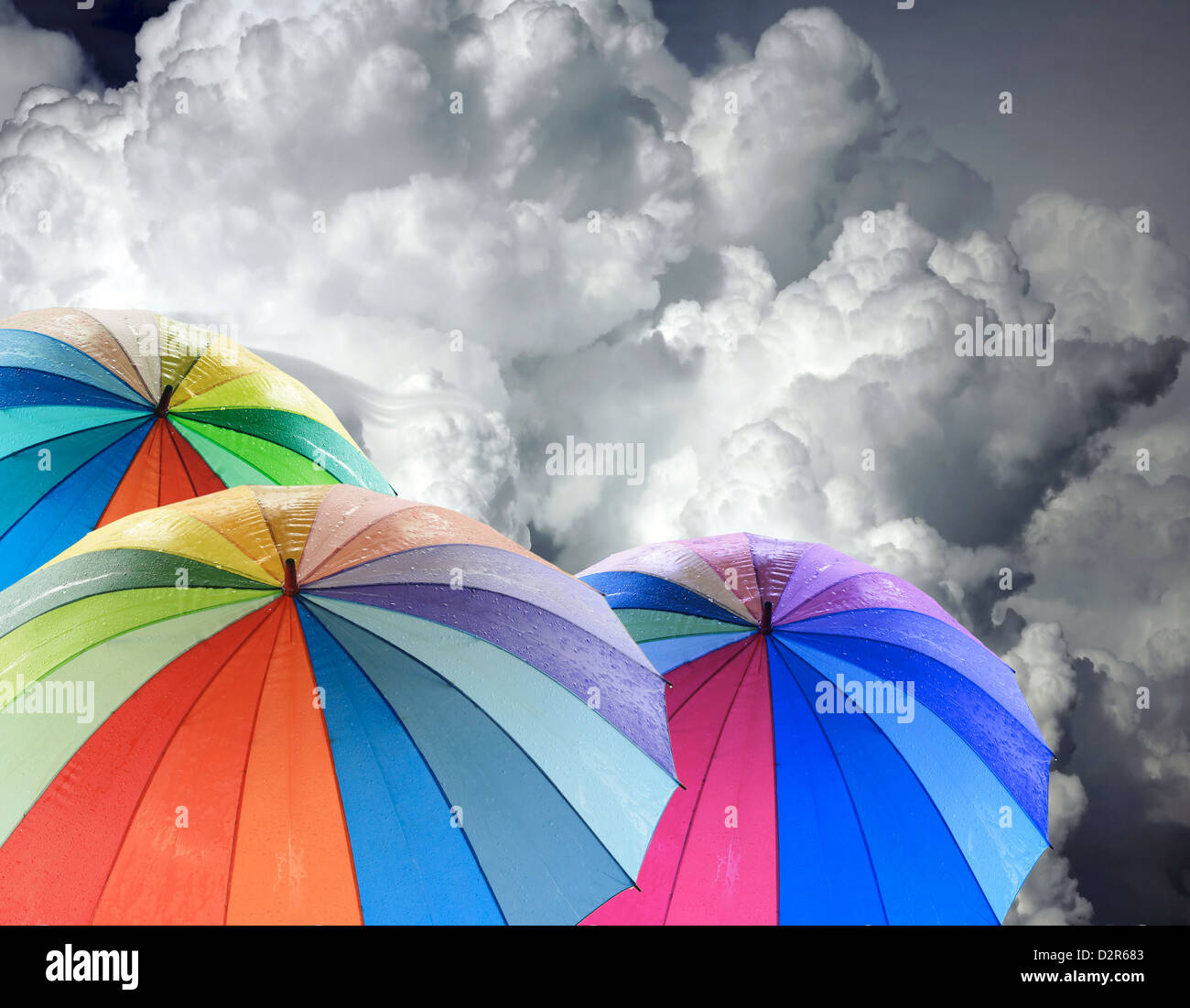 Rainbow umbrella against blue sky Stock Photo Alamy