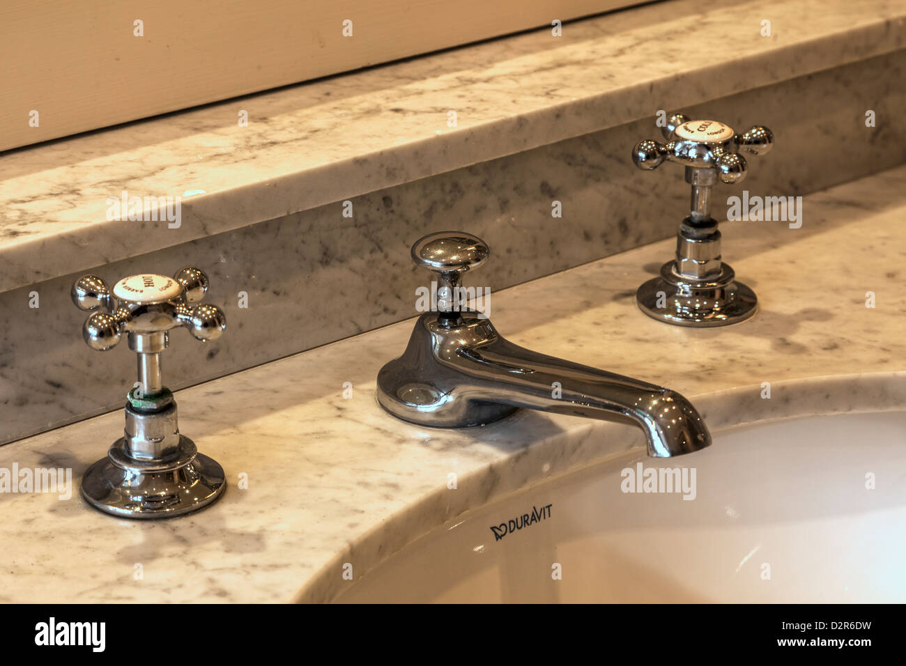 Hot and Cold Taps and Spout Stock Photo Alamy