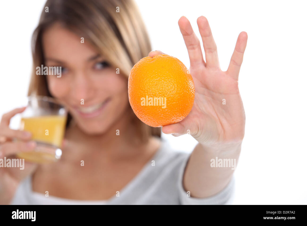 woman drinking a fresh orange juice Stock Photo Alamy