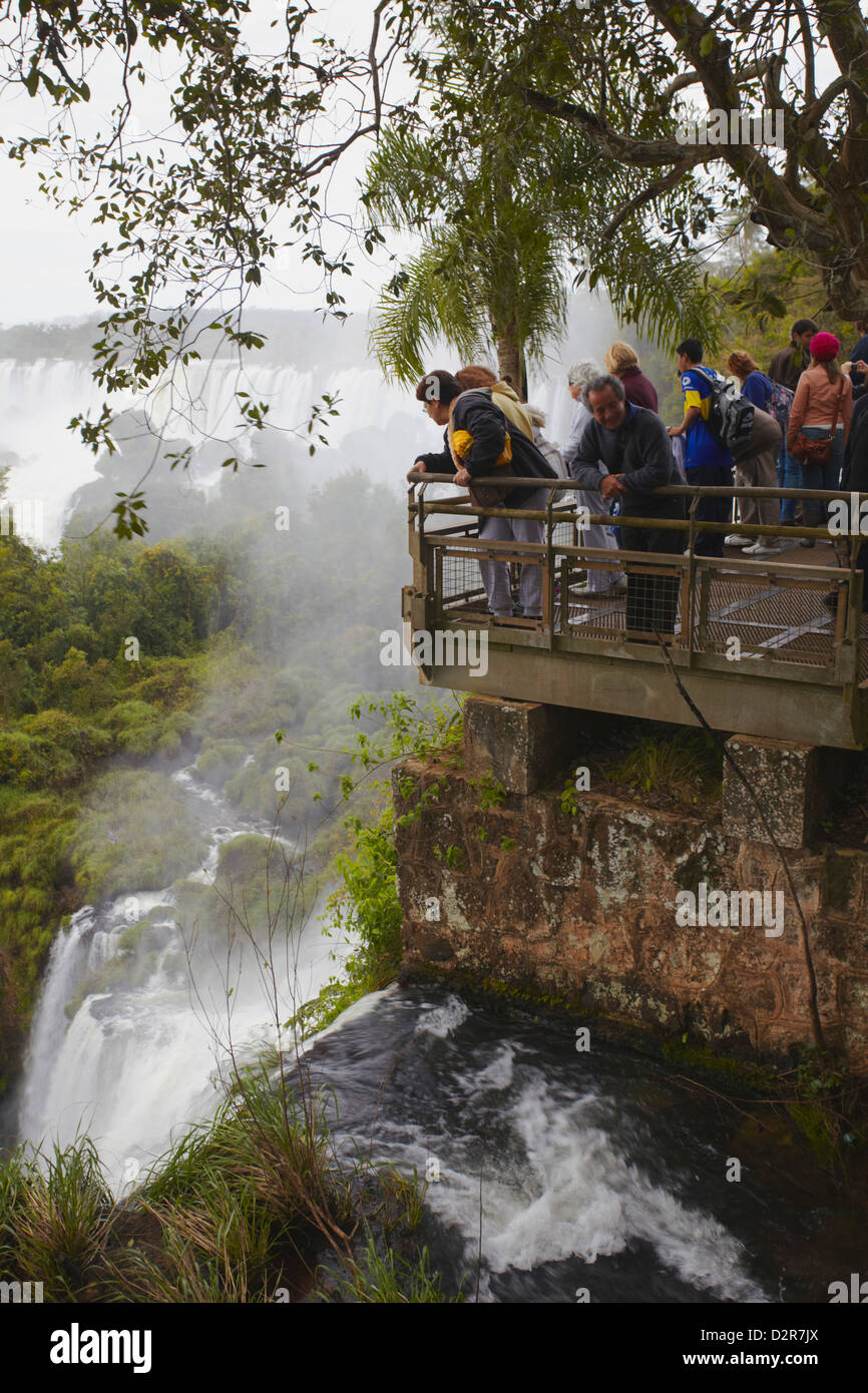 Tourists at Iguazu Falls, Iguazu National Park, UNESCO World Heritage Site, Misiones, Argentina, South America Stock Photo