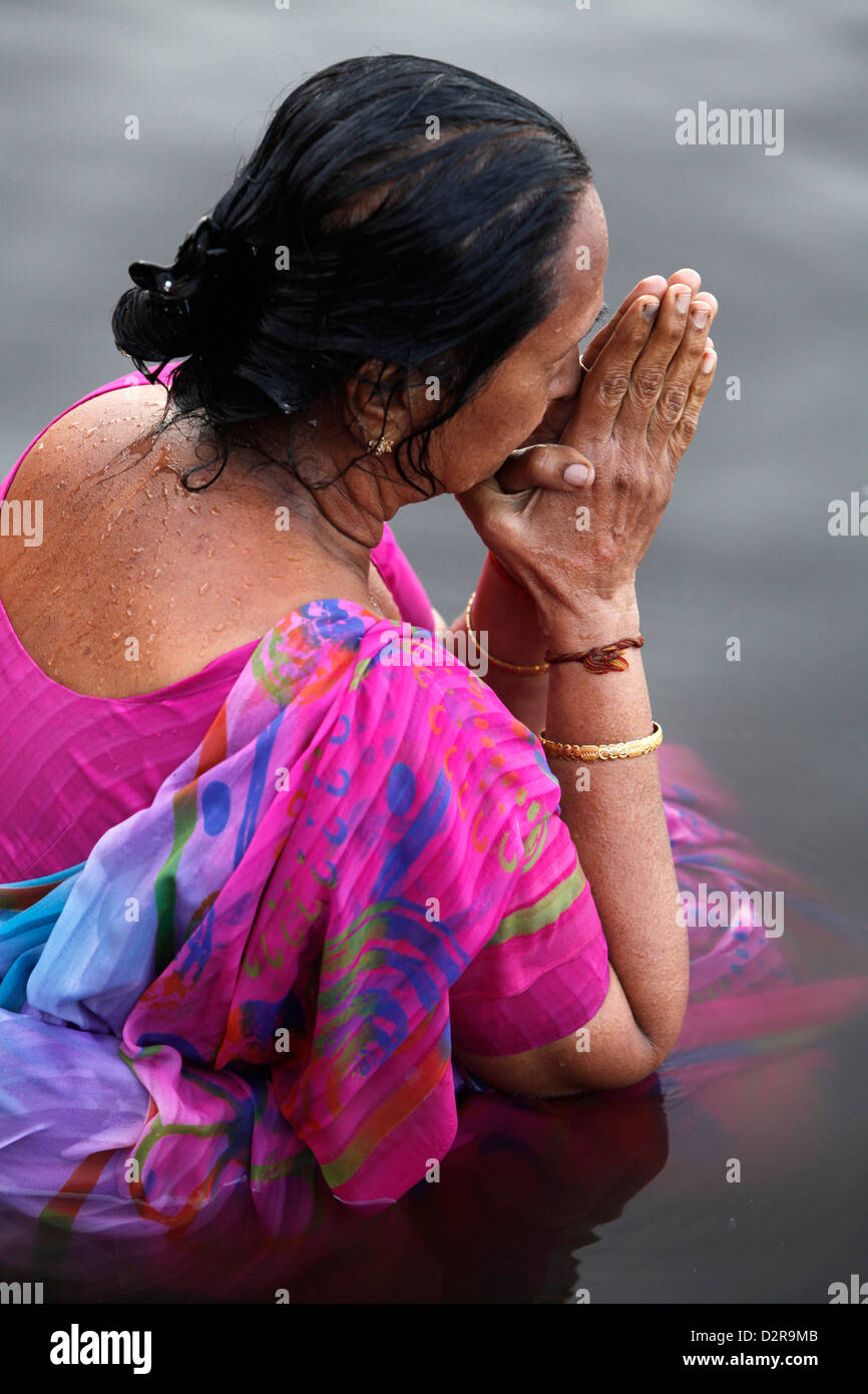 Hindu woman praying in the Yamuna River, Mathura, Uttar Pradesh, India, Asia Stock Photo