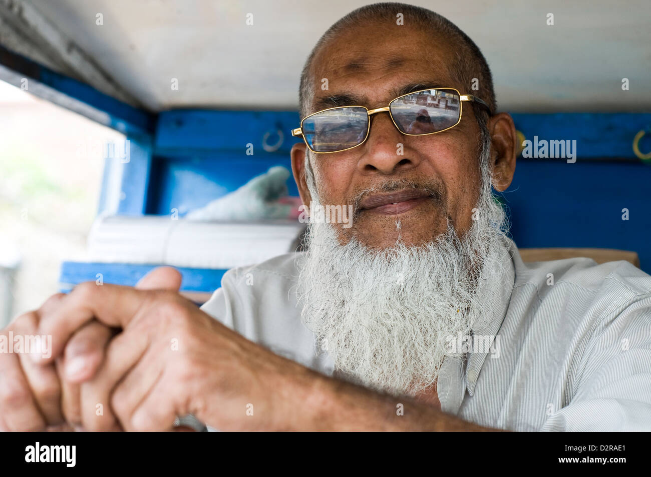 islamic man in shop, port louis, mauritius Stock Photo