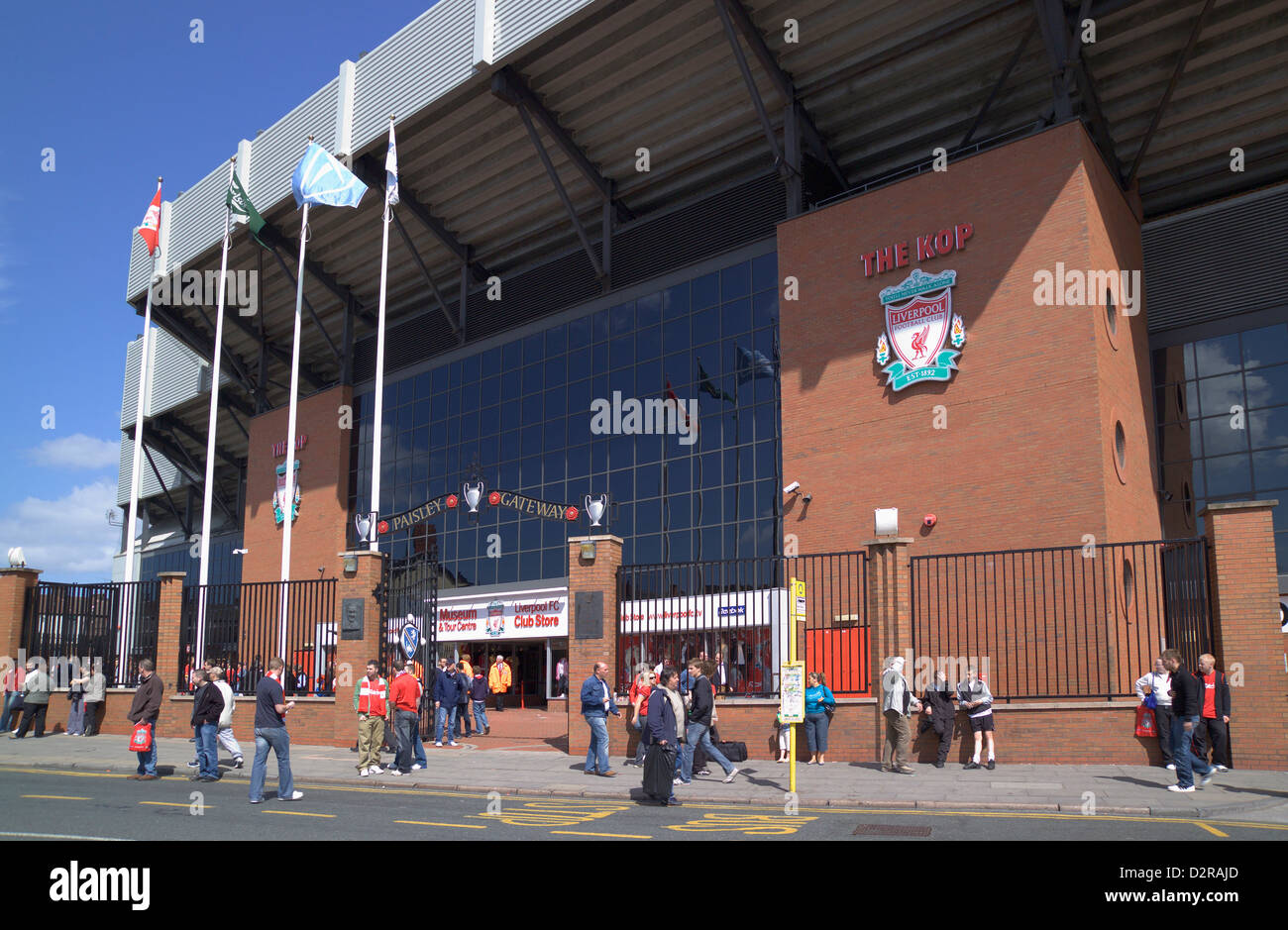 Fans going to the match Liverpool Football Ground Anfield Liverpool Merseyside England Stock Photo