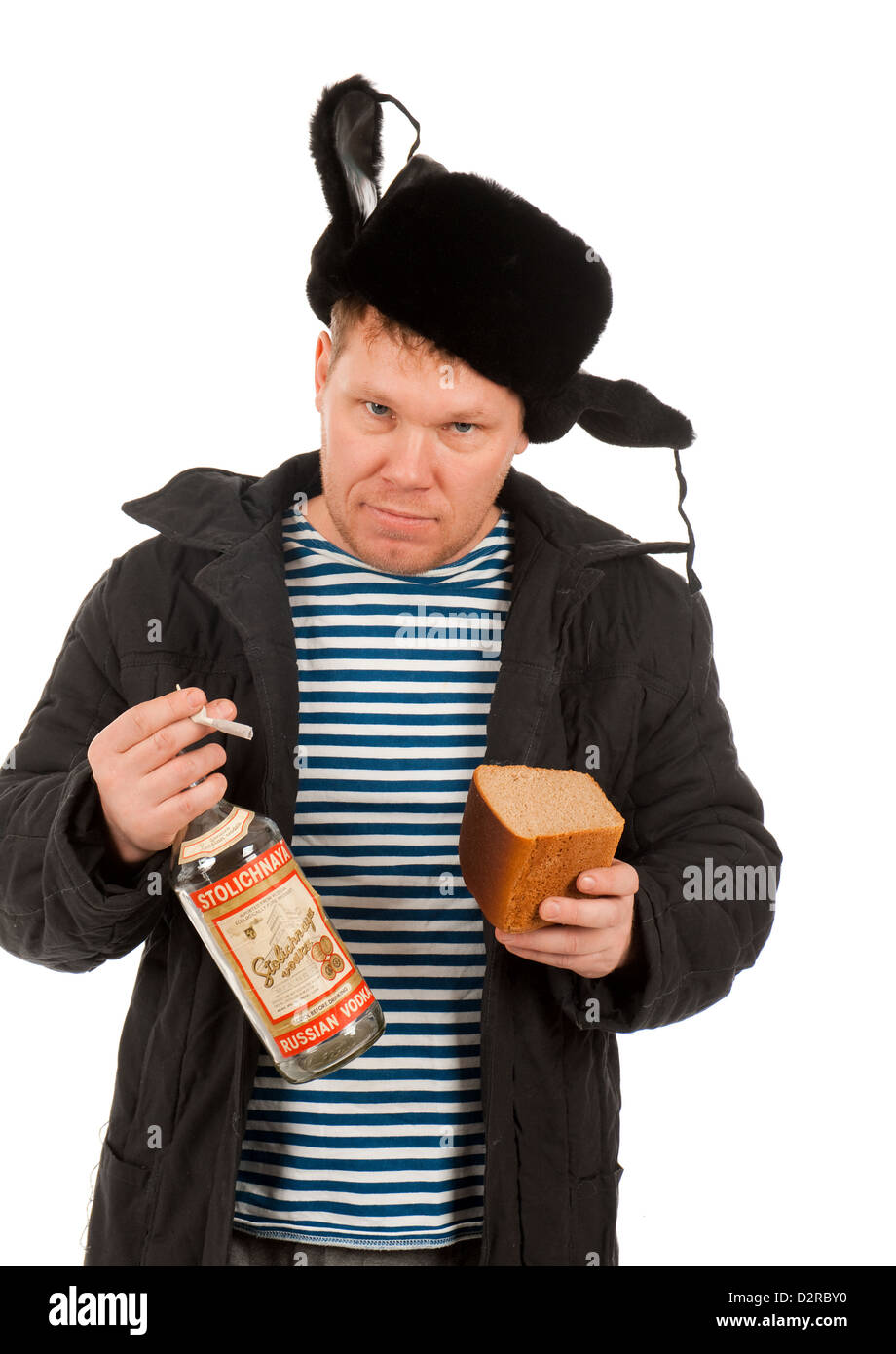 Russian Man in Fur Cap and Jacket with Vodka .isolated on white background Stock Photo