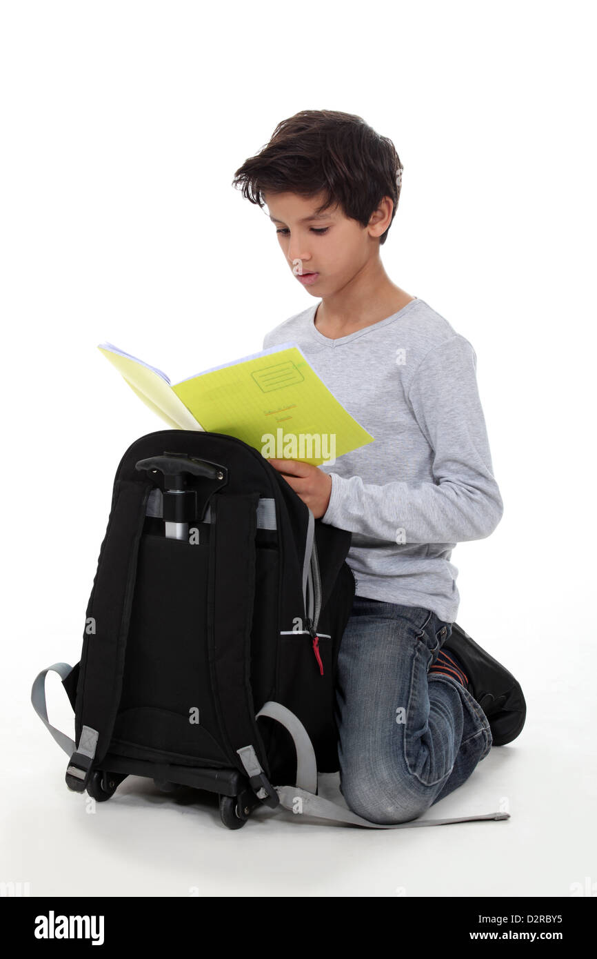 child with briefcase and notebook Stock Photo Alamy
