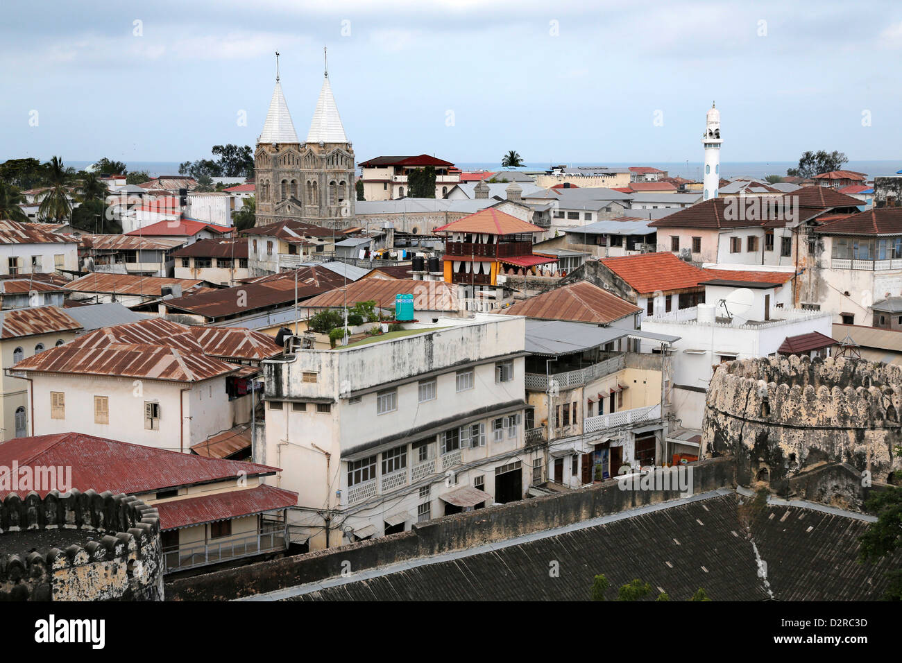 Stonetown of Zanzibar with St Josephs Cathedral and Mosque, Tanzania Stock Photo
