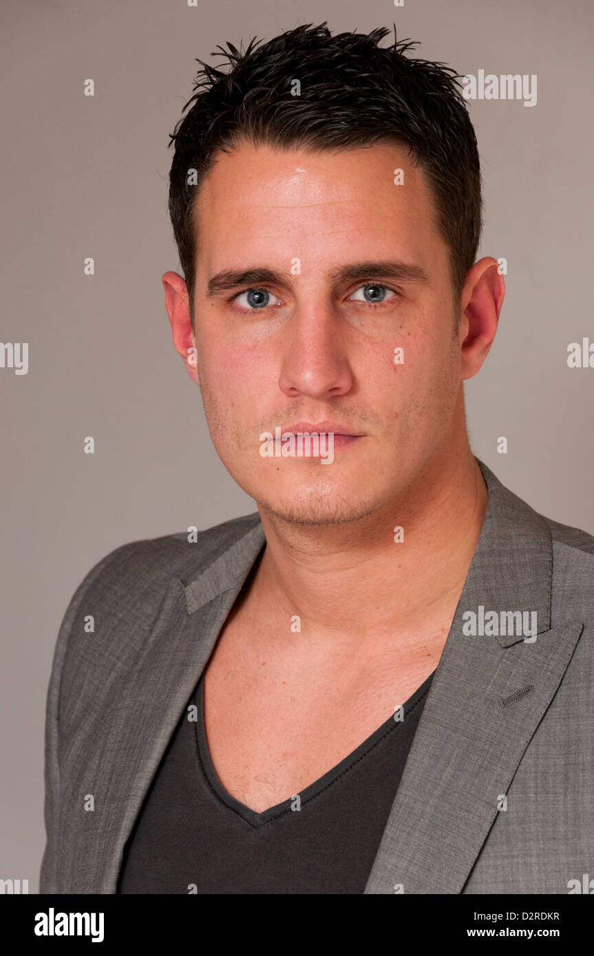 Handsome young man in smart casual clothing. Stock Photo