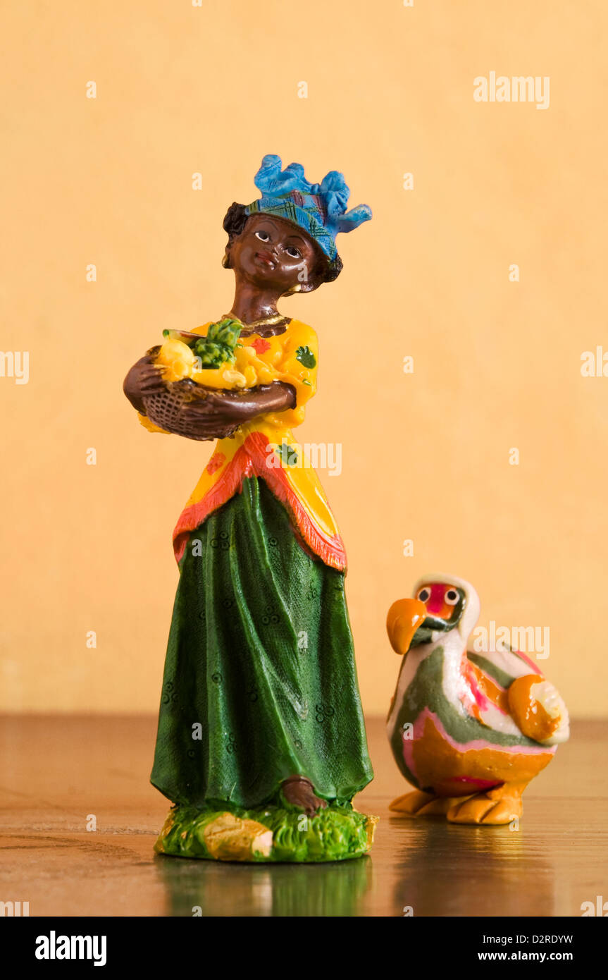 miniature image of creole woman with fruit and dodo, mauritius Stock Photo