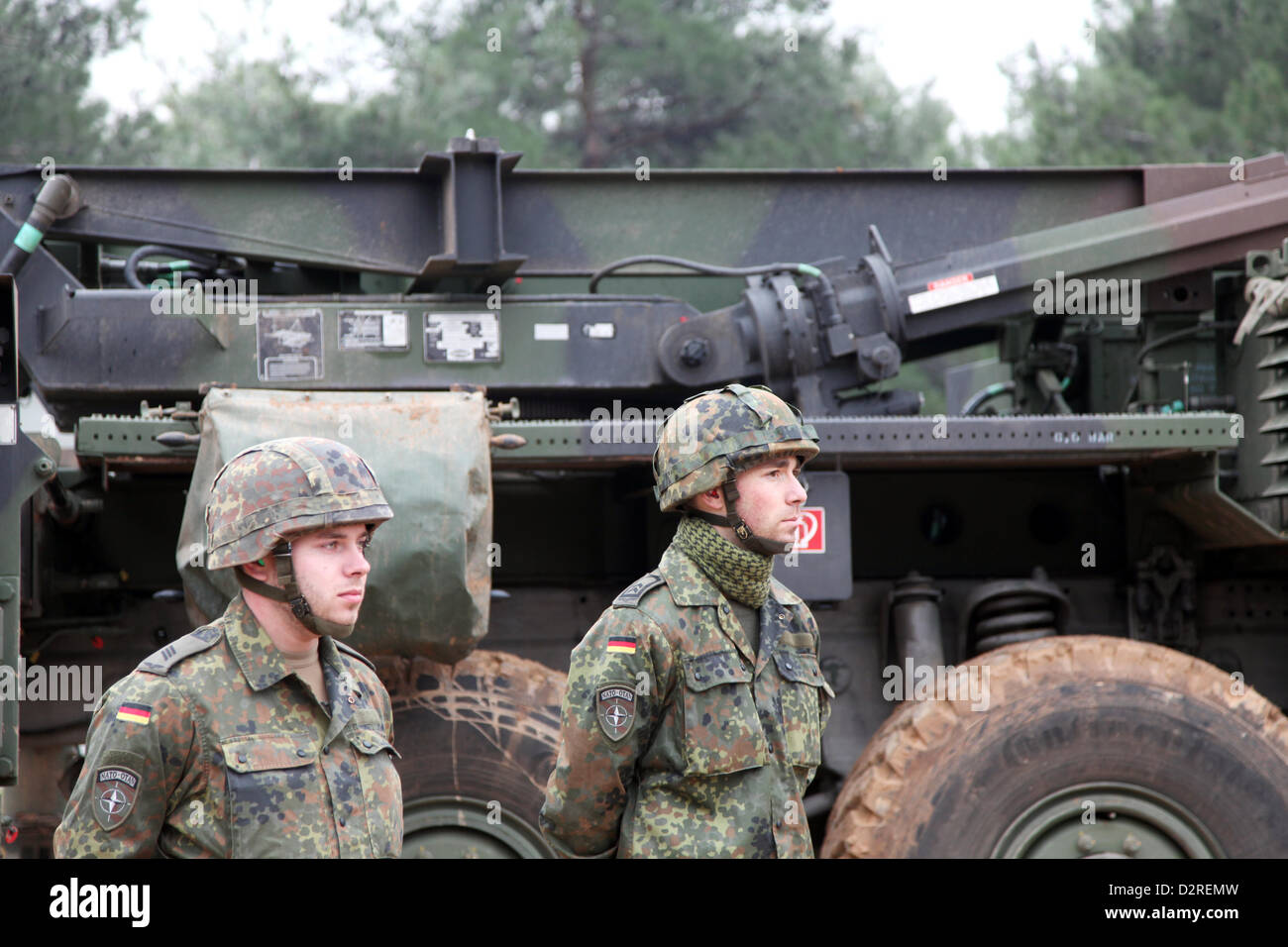 German soldiers stand next to an unassembled Patriot missile system in Kahramanmaras, Turkey, 31 January 2013. Photo: Carsten Hoffmann Stock Photo