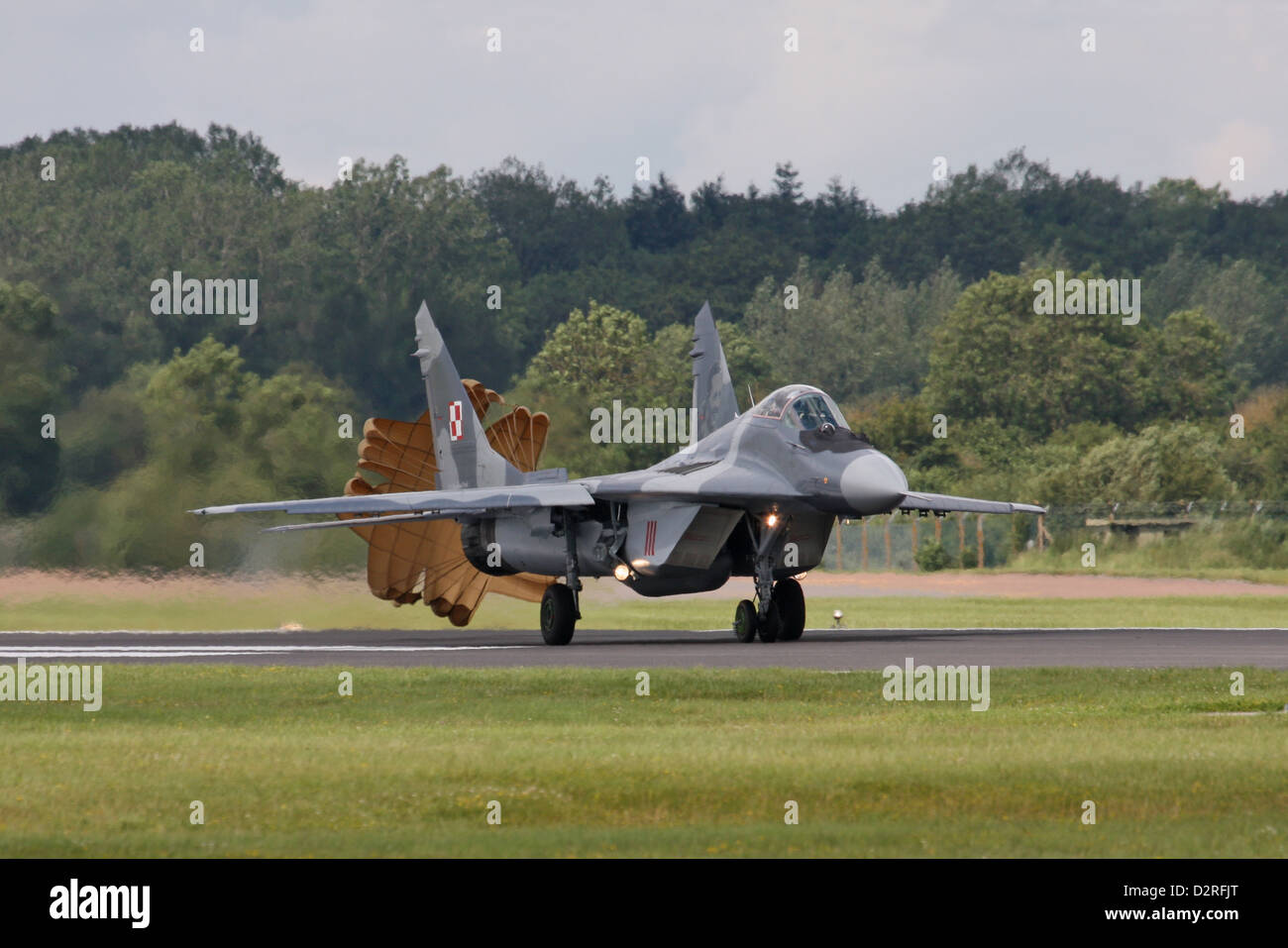 MiG-29A 111 of 1 ELT, Polish Air Force taxiing with its brake chute still attached having completed its display at RIAT 2012 Stock Photo