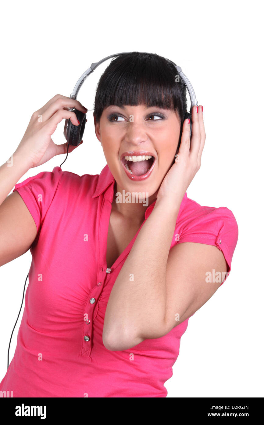 listening to loud music through headphones Stock Photo Alamy