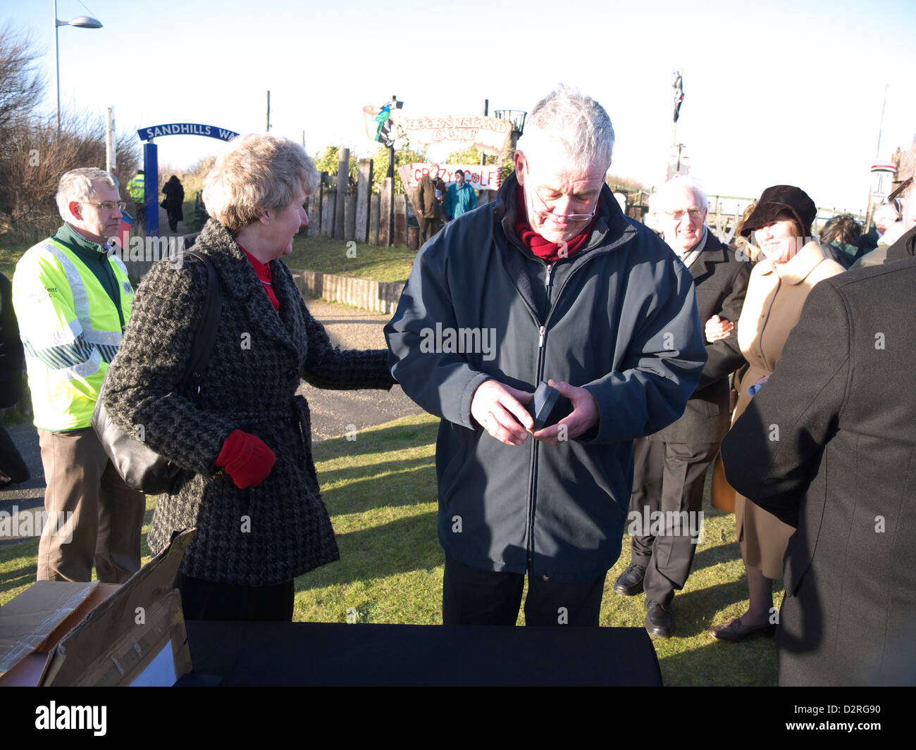 A Survivor Of The 1953 East Coast Floods Receiving A Commemorative 