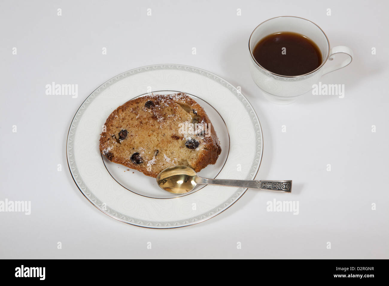 A piece of cake with a cup of coffee Stock Photo