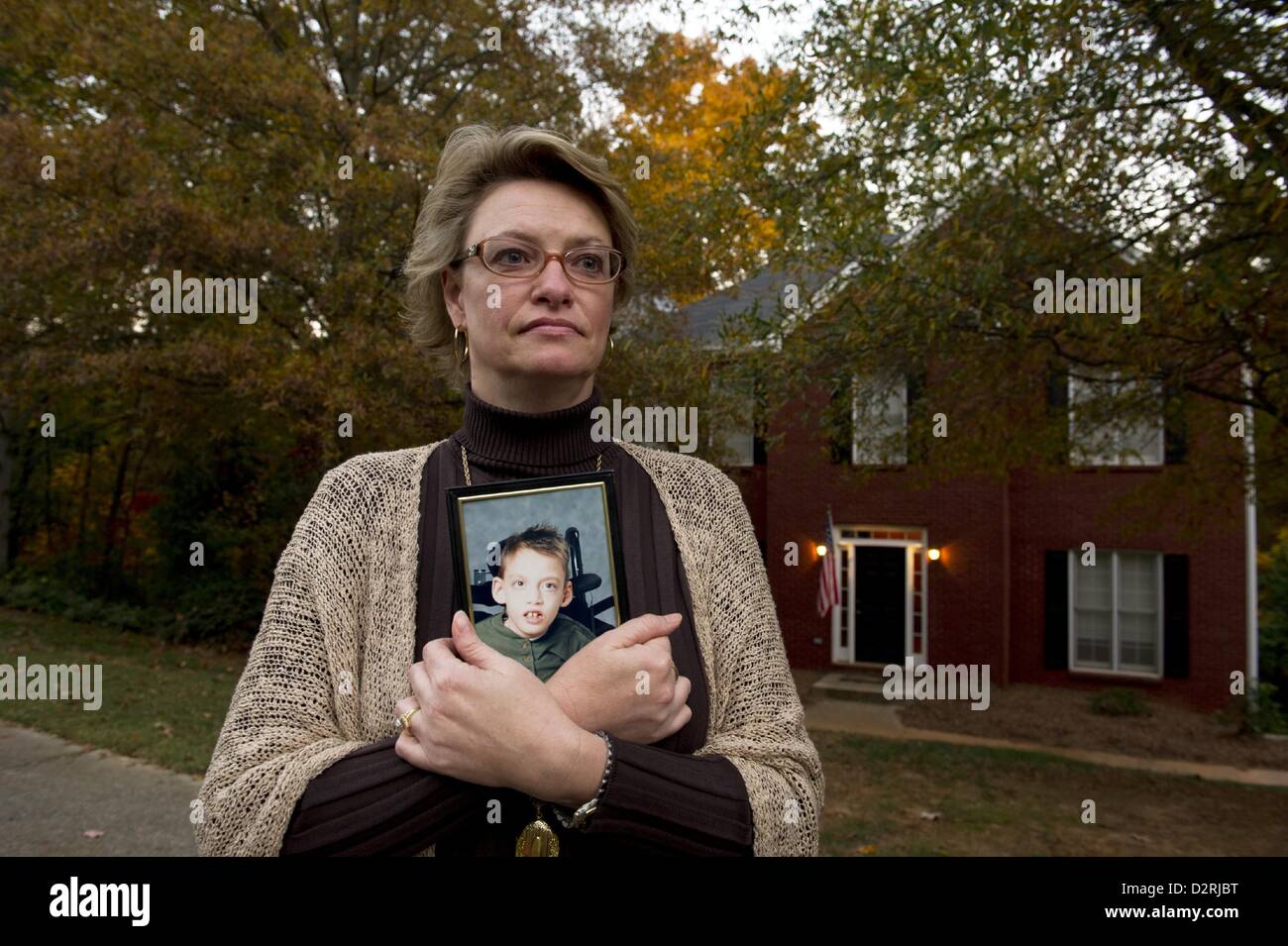 Oct. 31, 2011 - Kennesaw, GA - NOLA SAYNE'S profoundly disabled son ZACH was only ten years old when she was forced to make the gut-wrenching decision to place him in a nursing home. She was unable to find a facility in Georgia where they lived. The closest skilled-care facility that would accept him was 200 miles away from home.Nola thought about quitting her job as a paralegal, but she was a single mother then with two kids. She needed her salary, and she needed the health insurance for Zach. The state of Georgia would pay nothing if Zach lived at home. But it offered to pay the full cost of Stock Photo