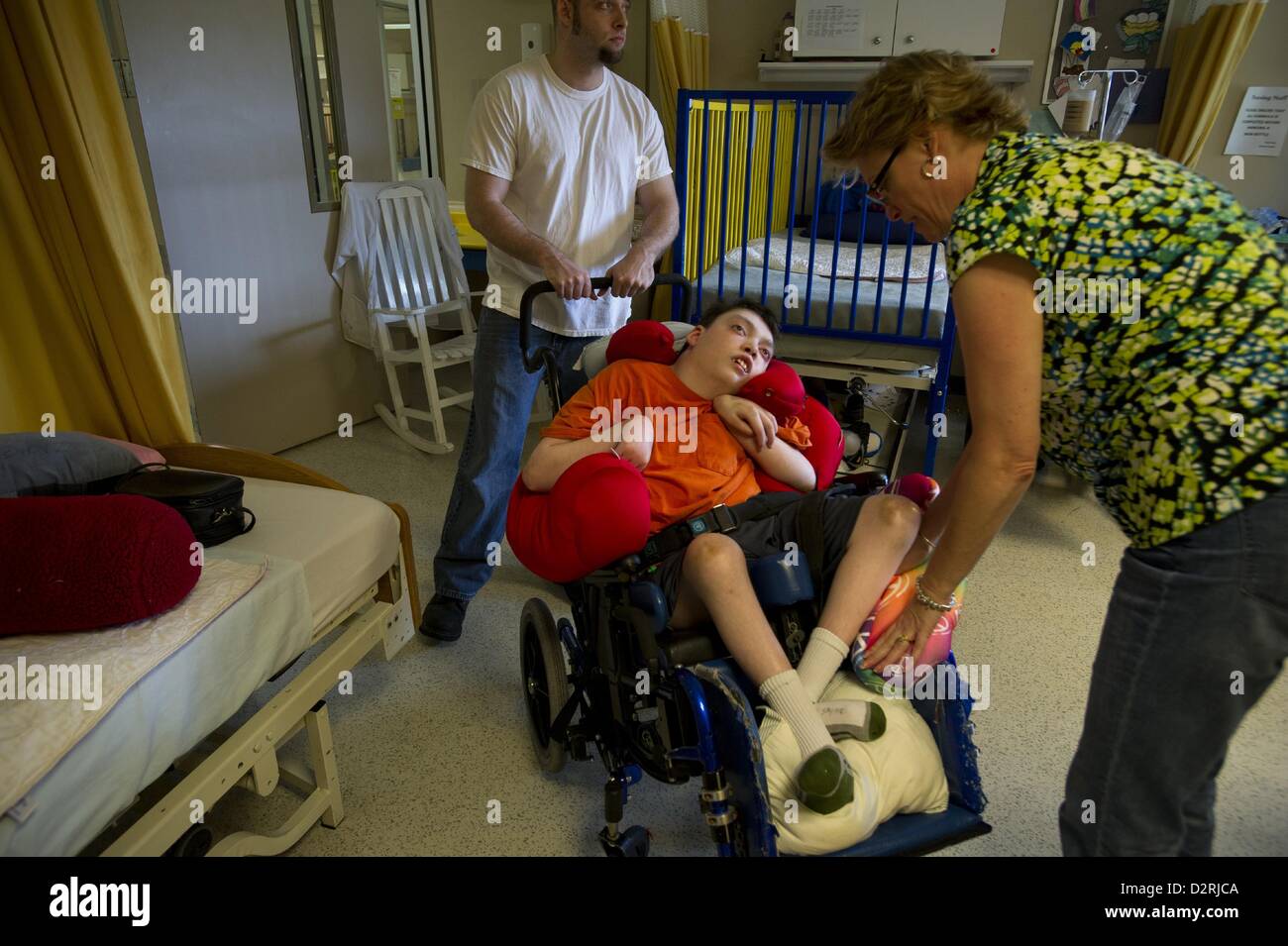 Sept. 3, 2011 - Montgomery, AL - NOLA SAYNE'S profoundly disabled son ZACH was only ten years old when she was forced to make the gut-wrenching decision to place him in a nursing home. She was unable to find a facility in Georgia where they lived. The closest skilled-care facility that would accept him was 200 miles away from home.Nola thought about quitting her job as a paralegal, but she was a single mother then with two kids. She needed her salary, and she needed the health insurance for Zach. The state of Georgia would pay nothing if Zach lived at home. But it offered to pay the full cost  Stock Photo