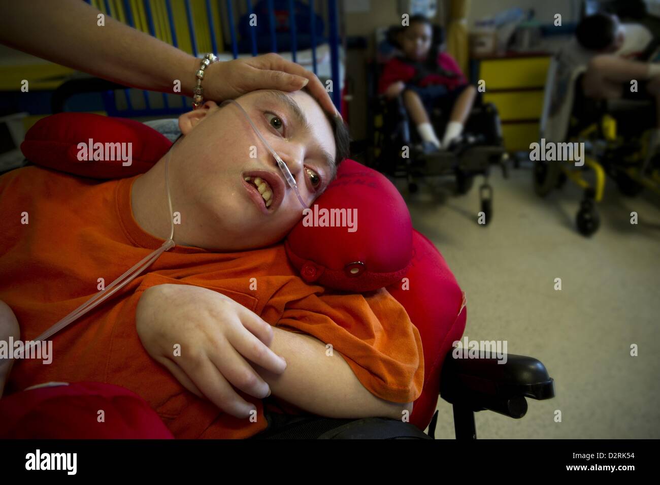 Sept. 3, 2011 - Montgomery, AL - NOLA SAYNE'S profoundly disabled son ZACH was only ten years old when she was forced to make the gut-wrenching decision to place him in a nursing home. She was unable to find a facility in Georgia where they lived. The closest skilled-care facility that would accept him was 200 miles away from home.Nola thought about quitting her job as a paralegal, but she was a single mother then with two kids. She needed her salary, and she needed the health insurance for Zach. The state of Georgia would pay nothing if Zach lived at home. But it offered to pay the full cost  Stock Photo
