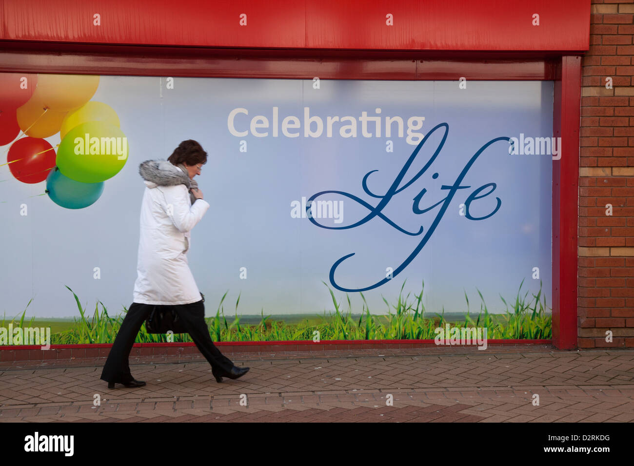 Celebrating Life, a Poster Window in Clintons Cards, Blackpool, Lancashire, UK Stock Photo