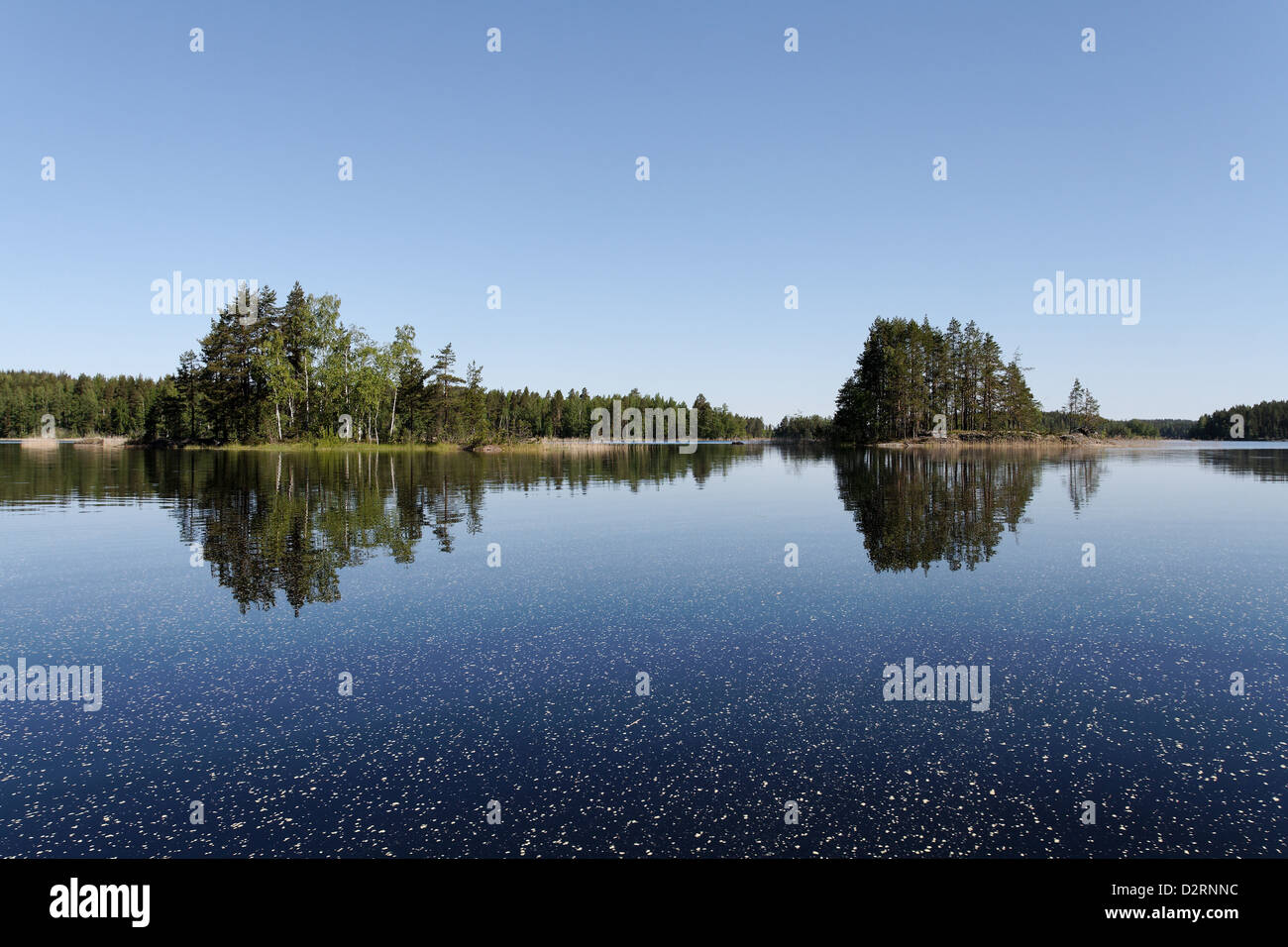 Reflected islands in Lake Haukivesi, Linnansaari National Park, Finland Stock Photo