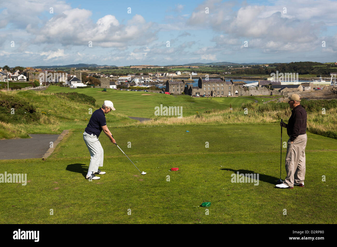 senior golfer teeing off, Ardglass golf club, Northern Ireland Stock Photo