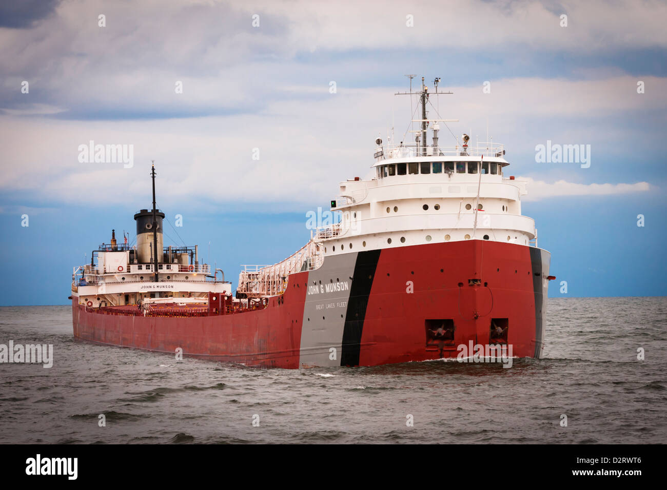 The freighter John G. Munson heads into Duluth Harbor from Lake Superior. Stock Photo