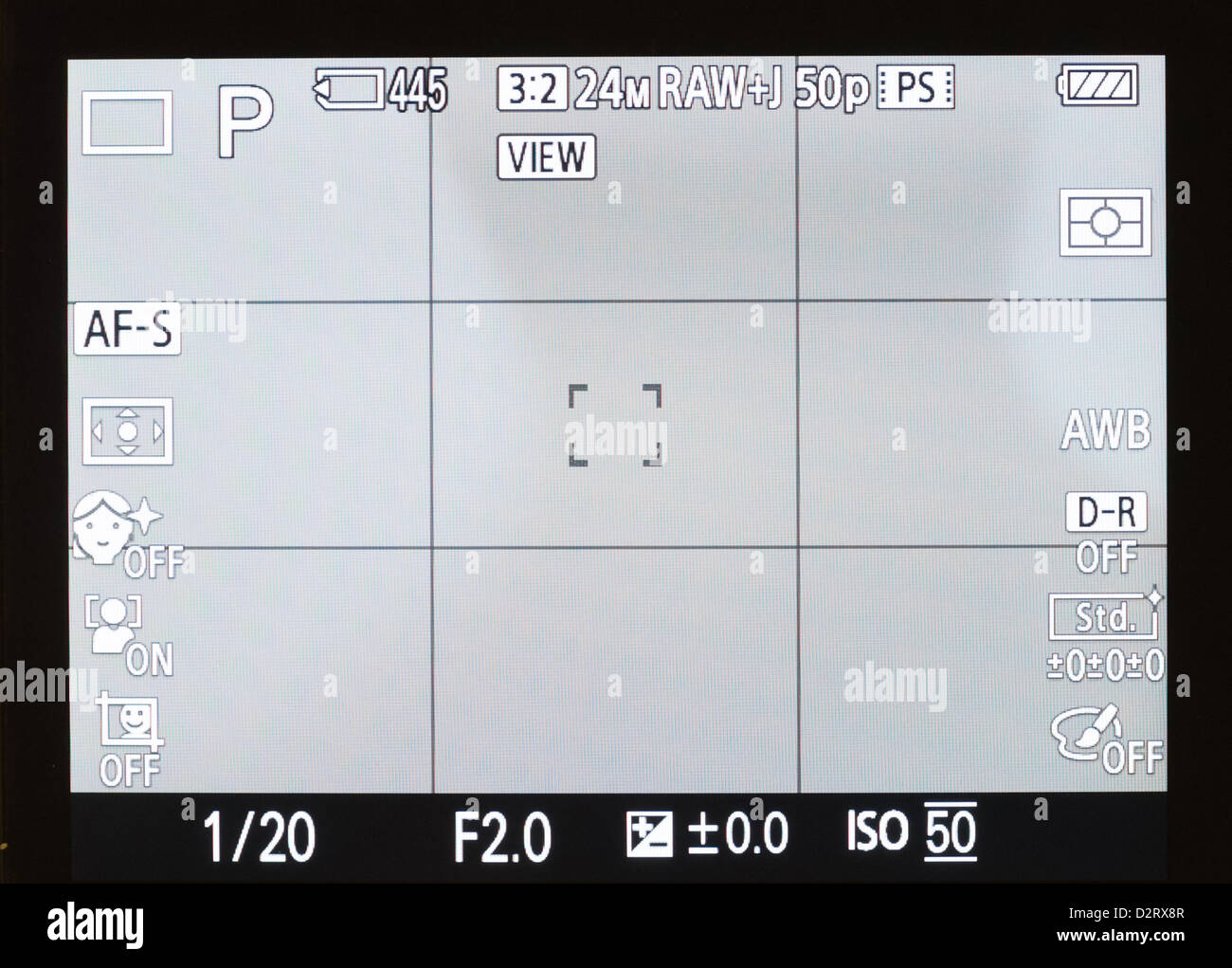 Sony Cyber-shot RX1 full frame digital camera. Rear LCD screen showing settings, and rule of thirds grid lines. Stock Photo