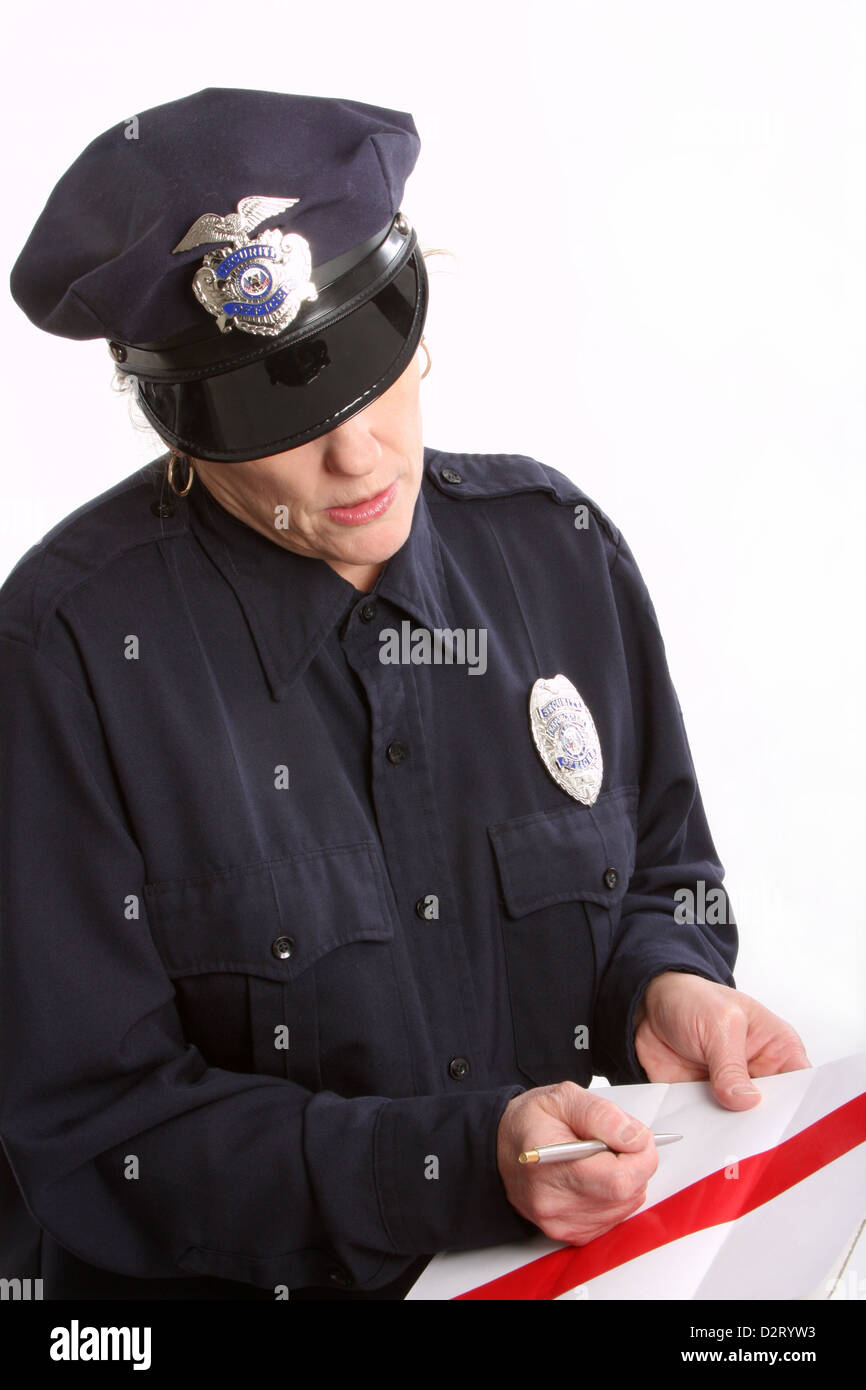 A woman security guard with red tape over the paperwork Stock Photo Alamy
