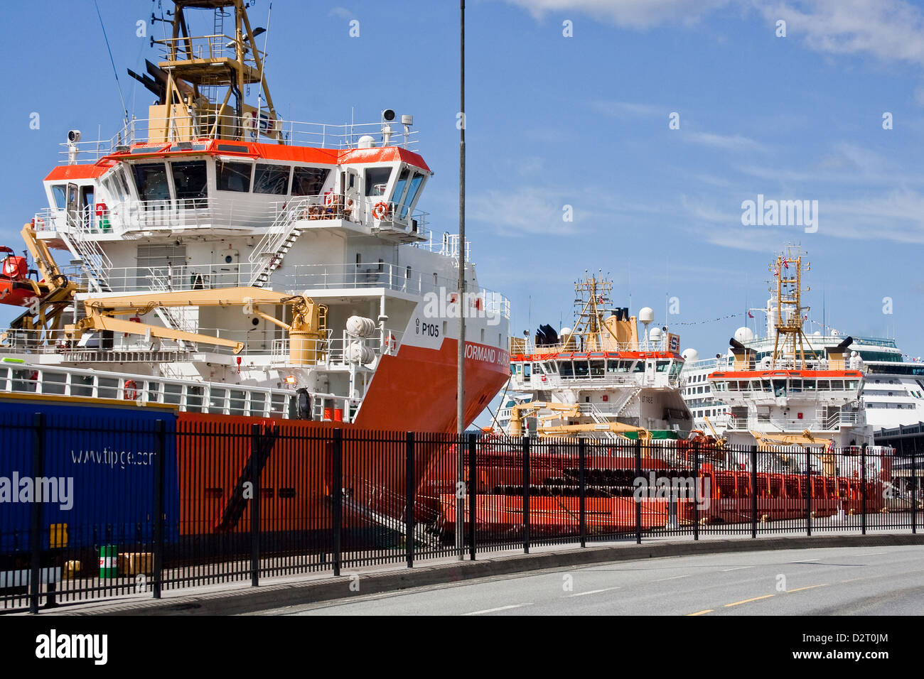 Oil rig support ships tied up in Bergen Harbour, Norway Stock Photo