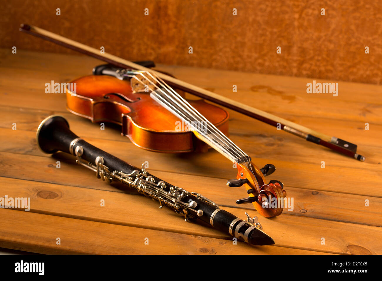 Classic music violin and clarinet in vintage wood background Stock