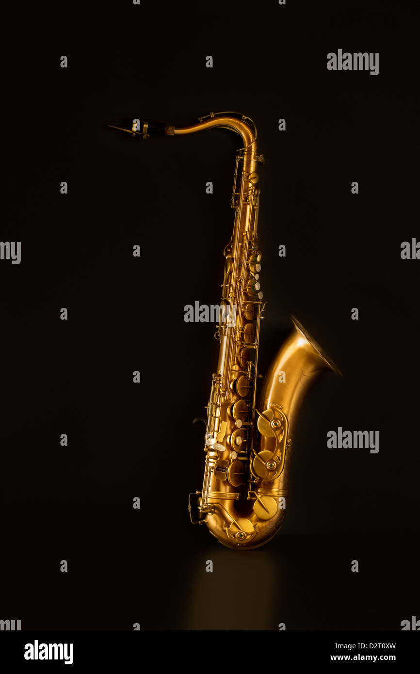 Sax golden tenor saxophone in black background Stock Photo Alamy