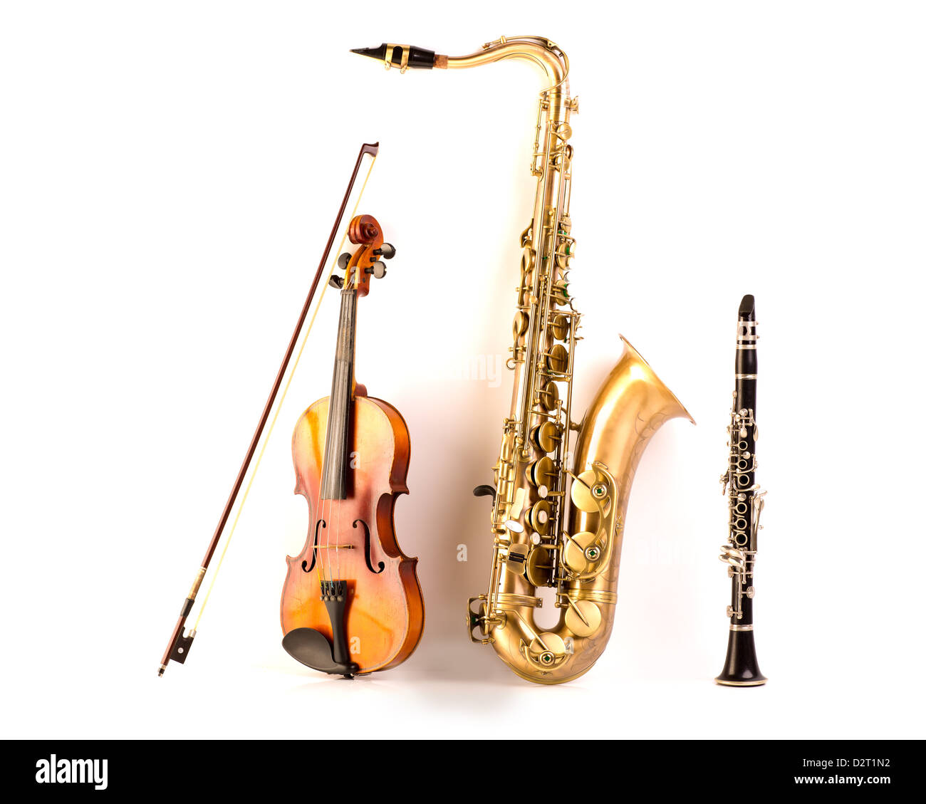 Music Sax tenor saxophone violin and clarinet in white background Stock Photo