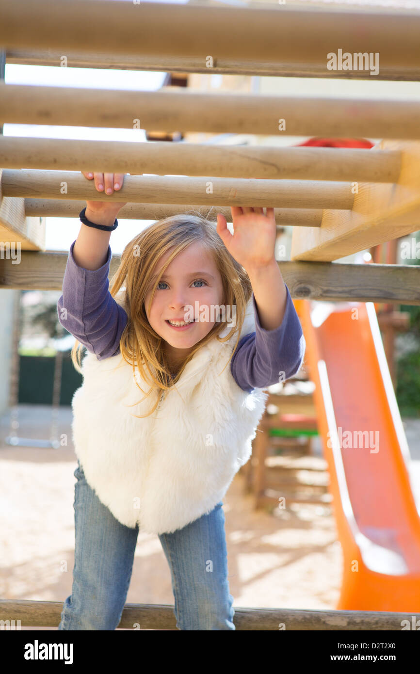 Hanging from playground bars hi-res stock photography and images - Alamy