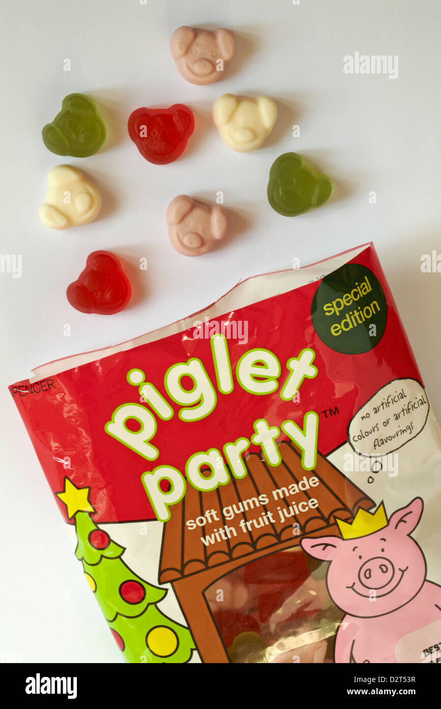 packet of Marks & Spencer special edition piglet party soft gums made with fruit juice opened to show contents set on white background Stock Photo