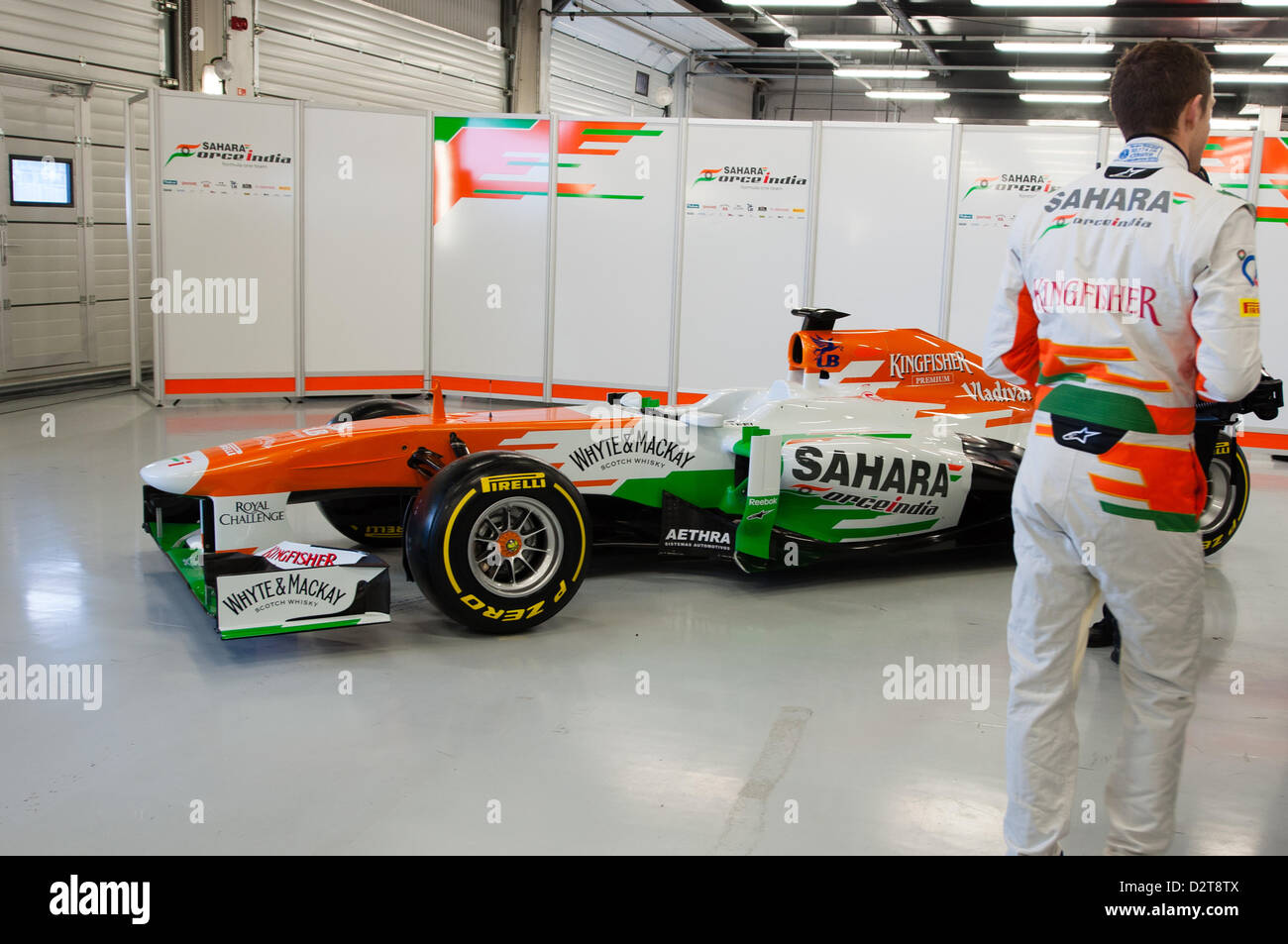 Silverstone, UK. 1st February 2013.  Paul di Resta (GBR) talks to the media, with Force India's 2013 F1 car, the VJM06, in the background.  Credit:  Elaine Scott / Alamy Live News Stock Photo