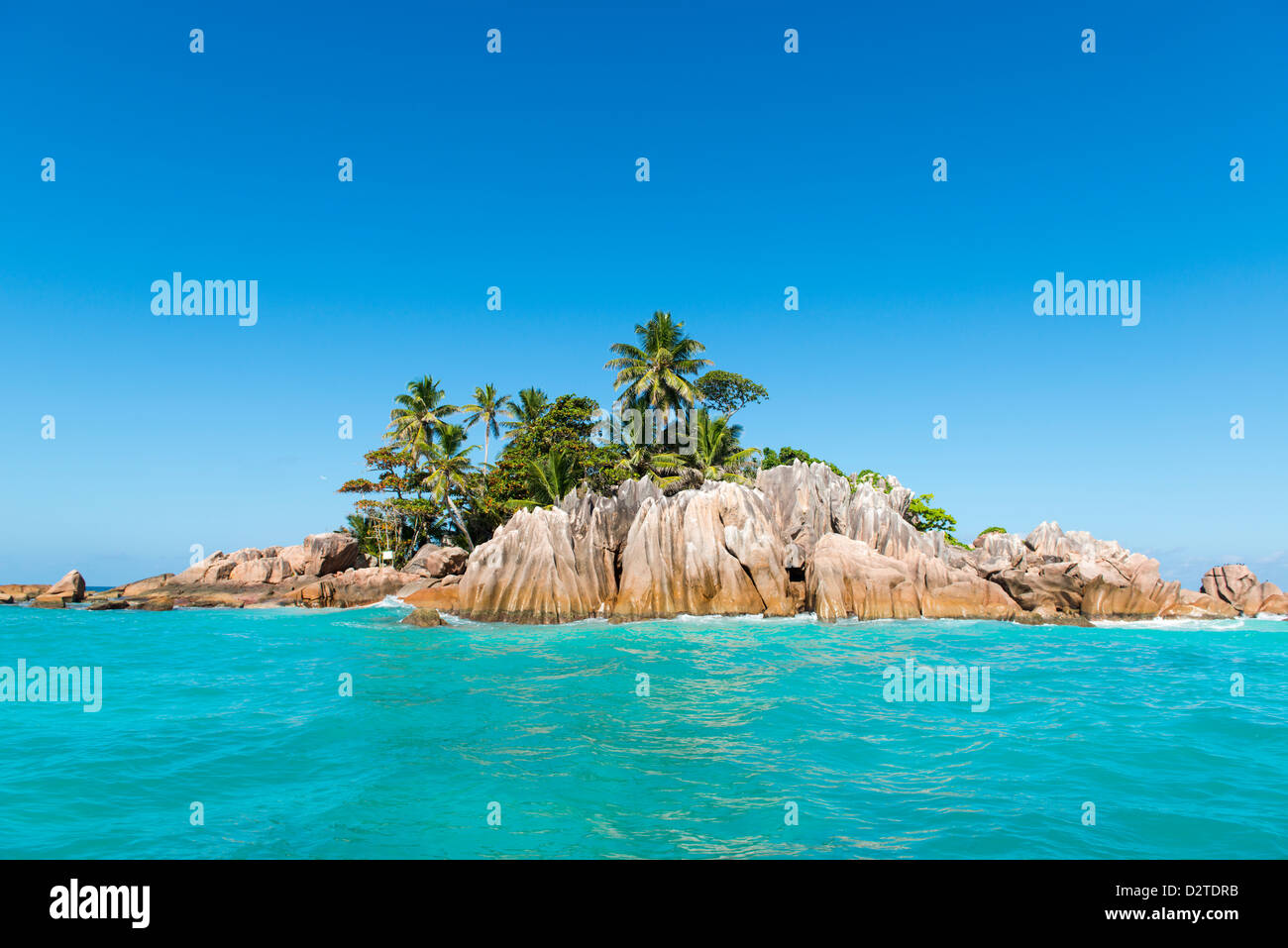 Tropical Island. Calm exotic beach resort in background Stock Photo