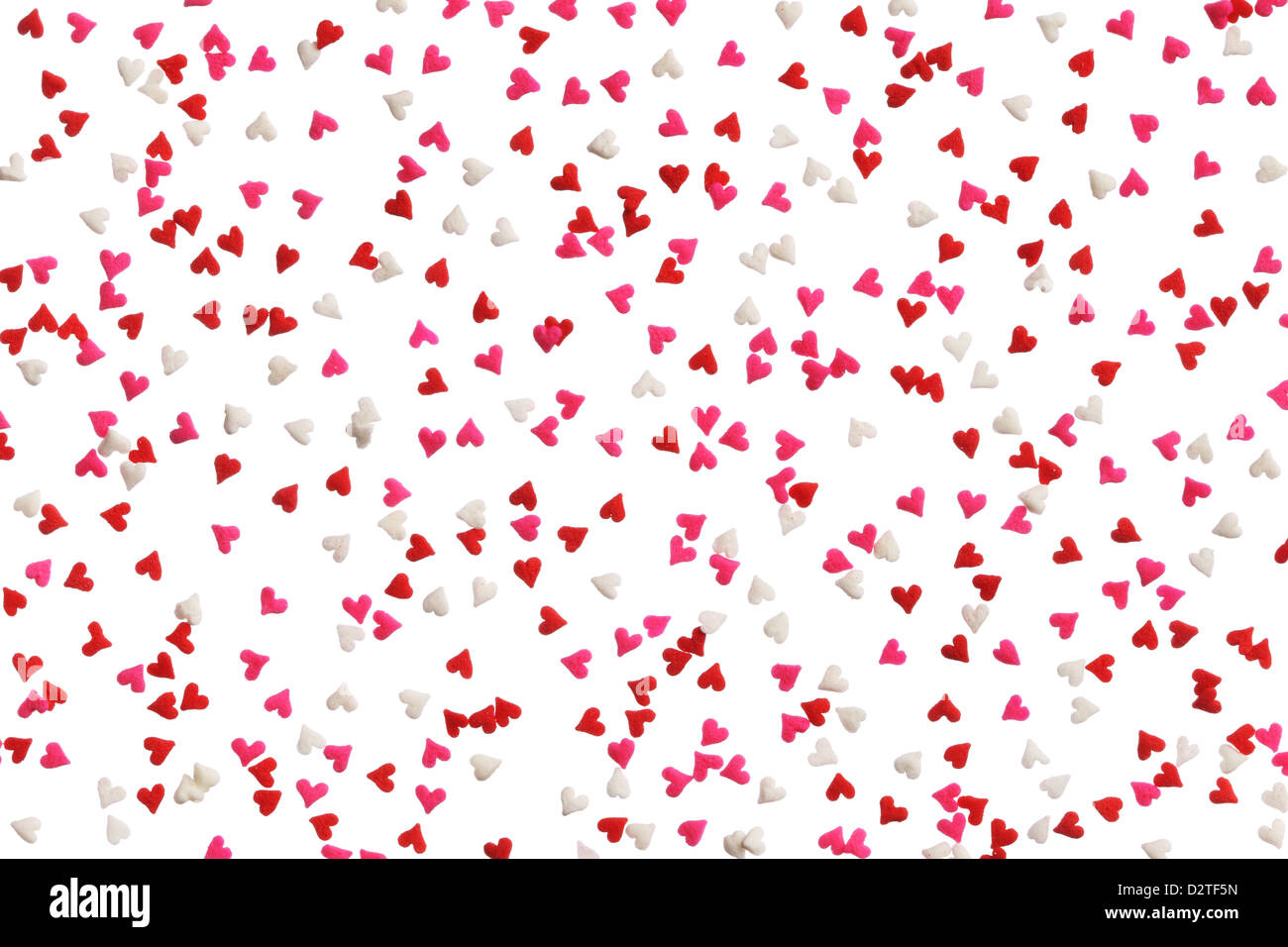 Background of heart sprinkles in red, pink and white Stock Photo