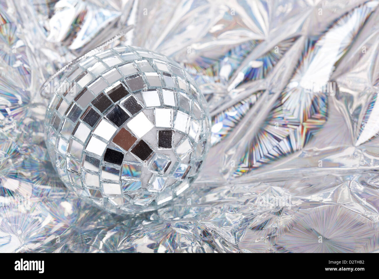 Creative Christmas concept. Shiny gold disco balls over red background.  Flat lay, top view. New year Stock Photo by jchizhe