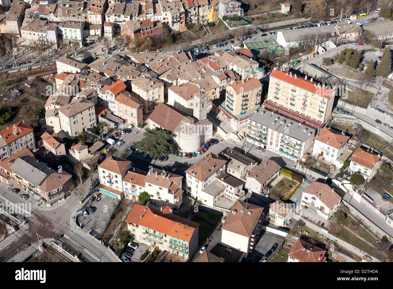 AERIAL VIEW. Small town in the Var Valley. Puget-Théniers, French Riviera's backcountry, Alpes-Maritimes, France. Stock Photo