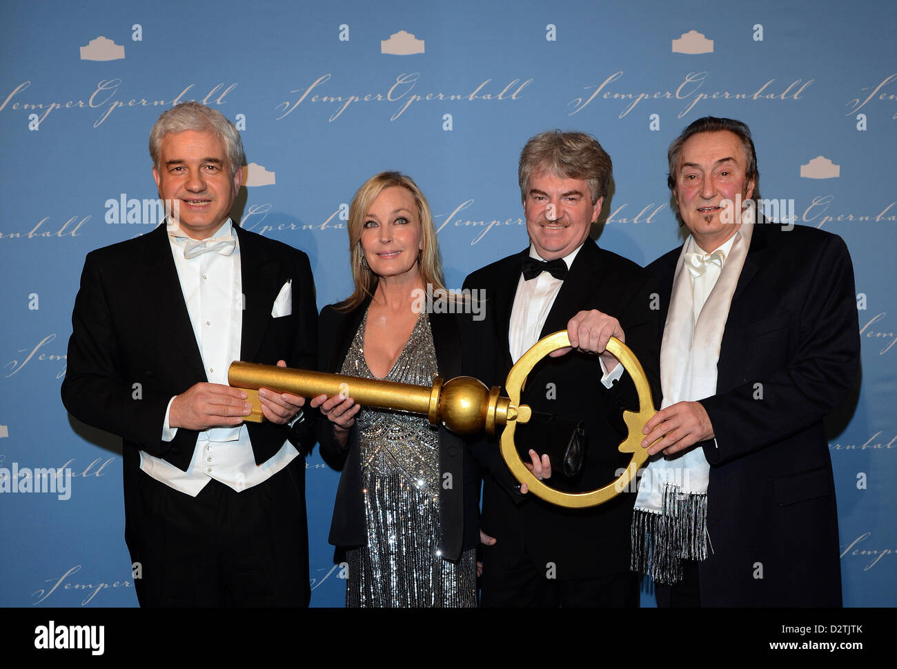 Artistic director of the Semper Opera Ball Hans-Joachim Frey (L-R), US actress Bo Derek, Wolfgang Rothe and Bernd Aust attend the 8th Semper Opera Ball in Dresden, Germany, 01 February 2013. This year's motto of the ball is 'Enchanting Dresden'. Photo: Jens Kalaene Stock Photo