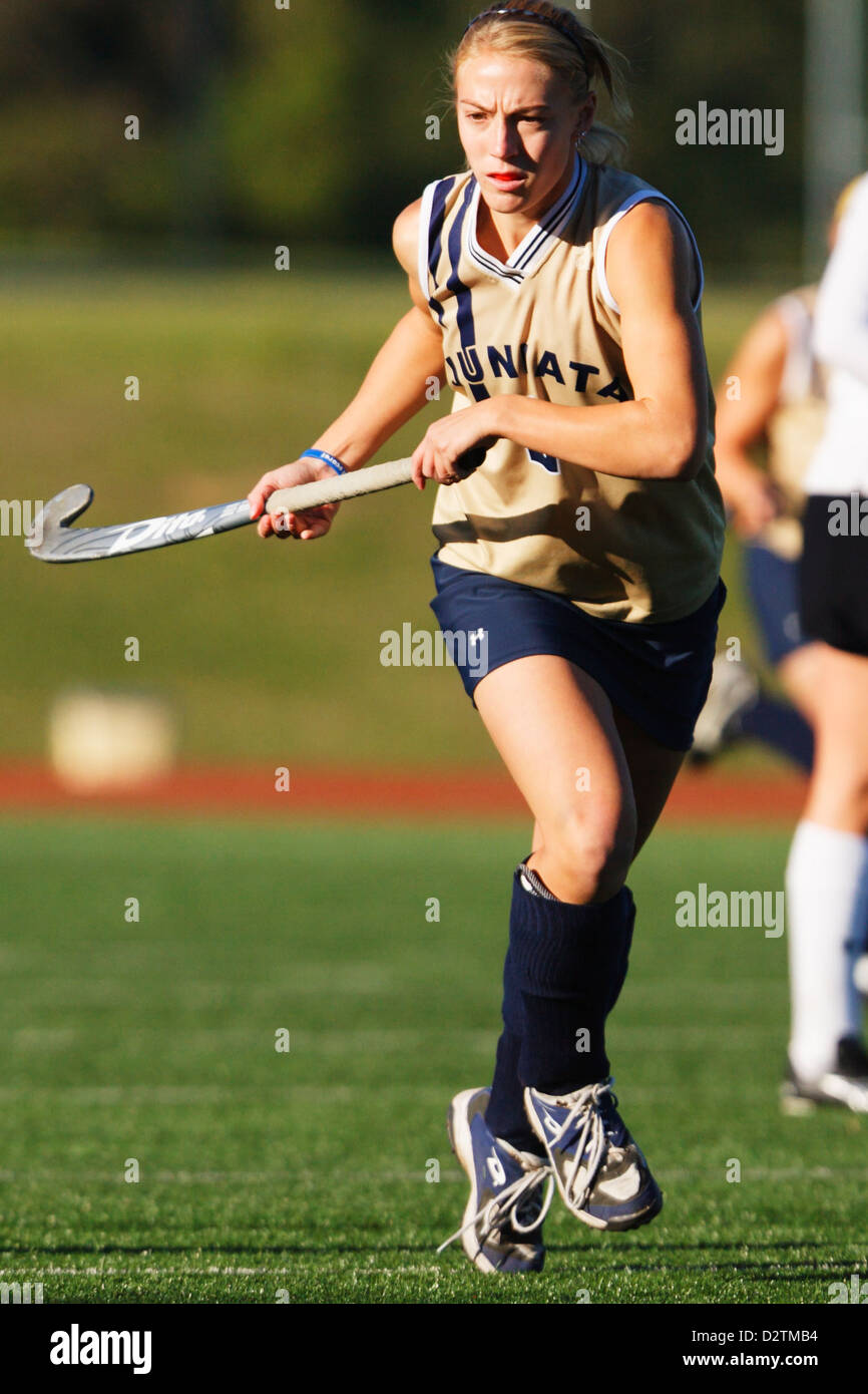 A Juniata College player in action during the Landmark Conference field hockey championship
