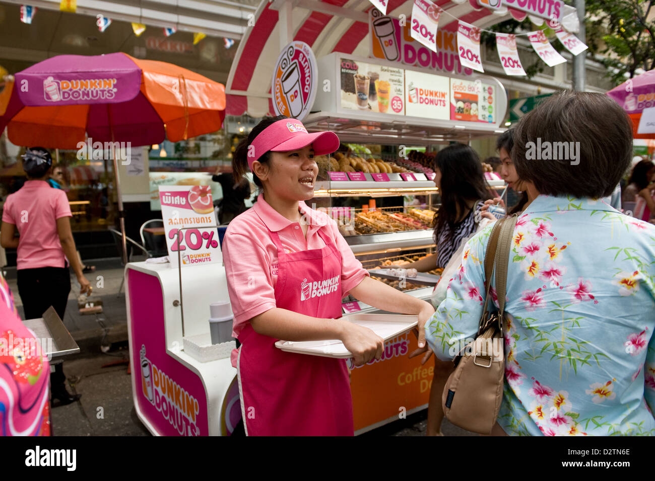 Bangkok, Thailand, street level of Dunkin Donuts on the Sala Daeng Street Festival Stock Photo