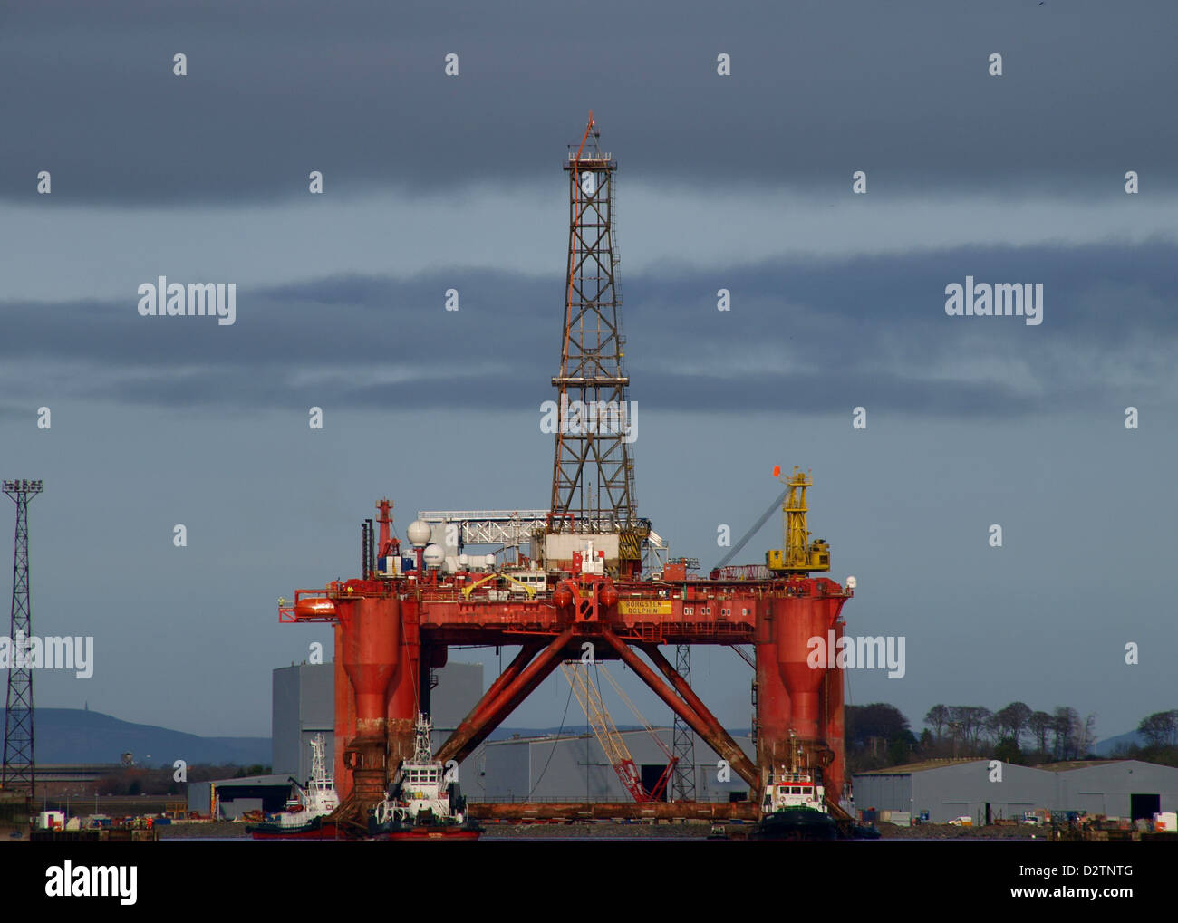The Borgston Dolphin oil rig being maneuvered from the dry dock at the ...
