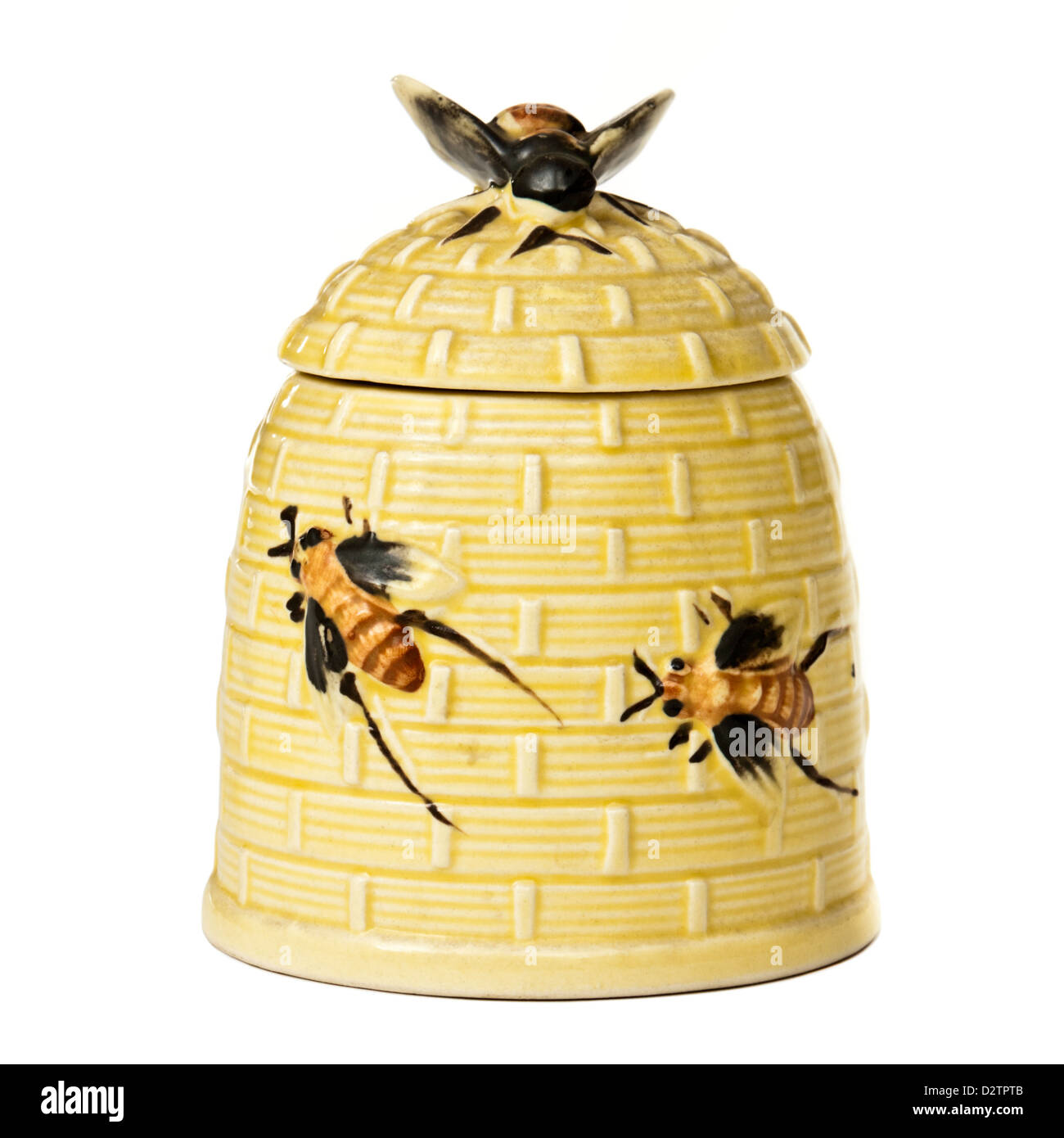 Vintage porcelain beehive-shaped honey pot Stock Photo