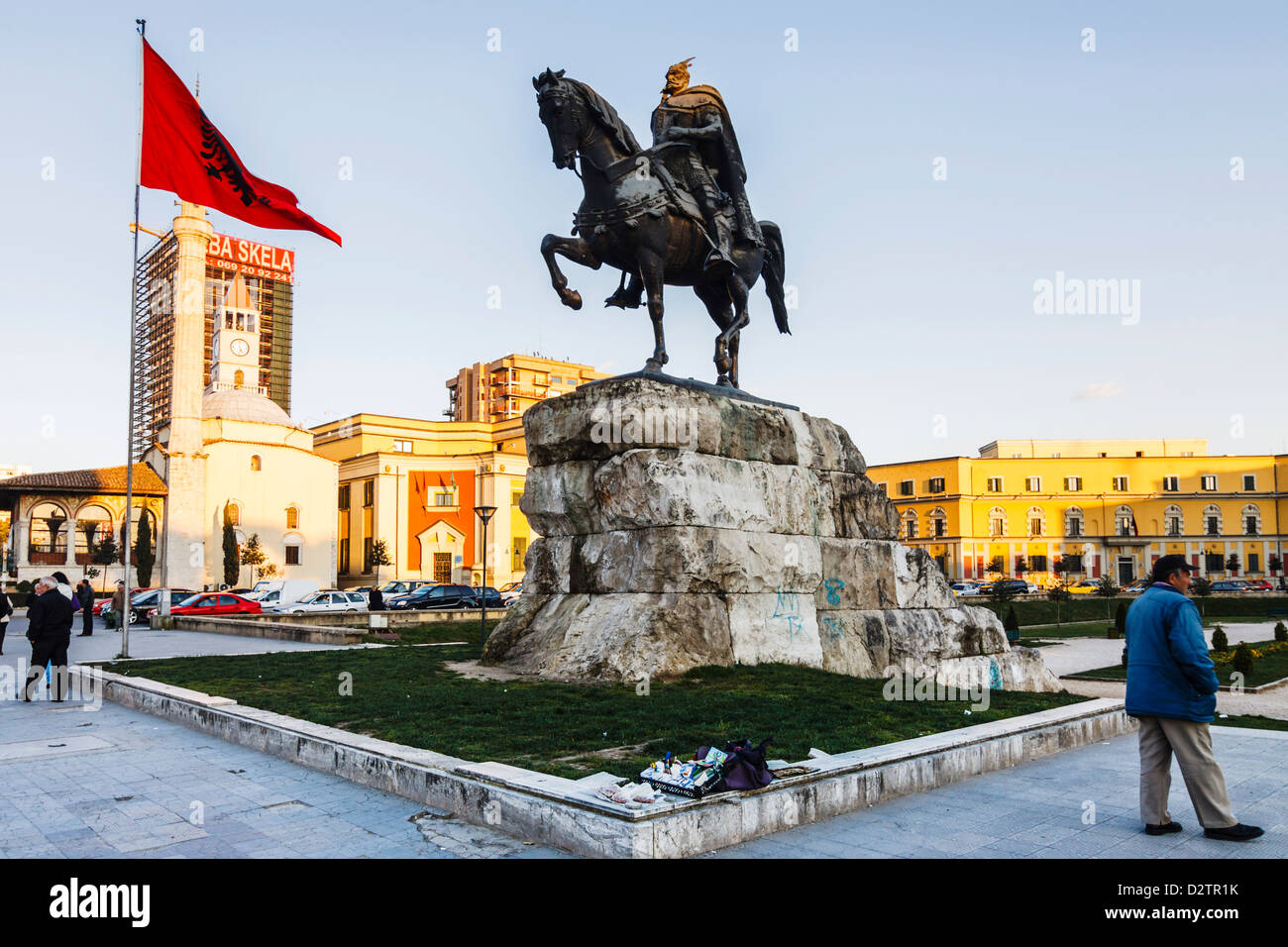 Skanderbeg statue, Albanian flag and Ethem Bey mosque at Skanderbeg square. Tirana, Albania Stock Photo