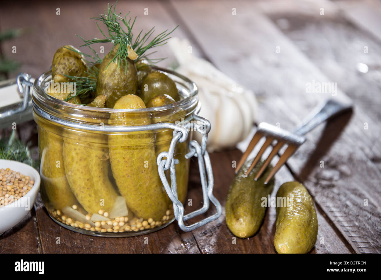 Gherkins with fresh dill in a glass Stock Photo Alamy